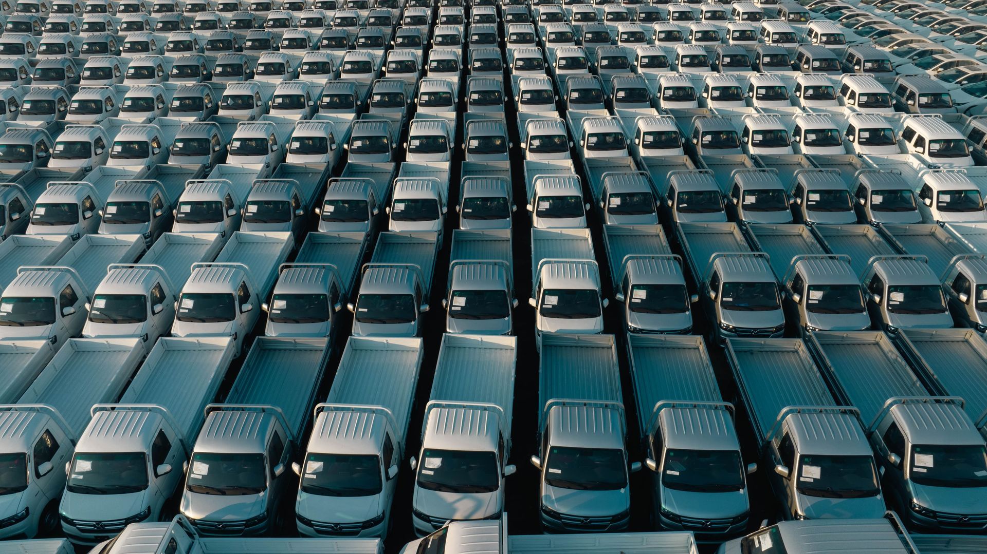 Many of the same car together in a parking lot