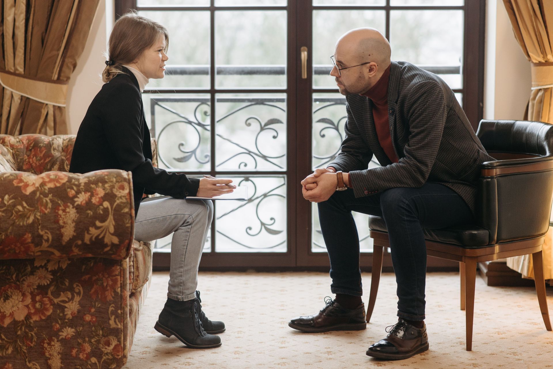 Man and woman sitting across from each other