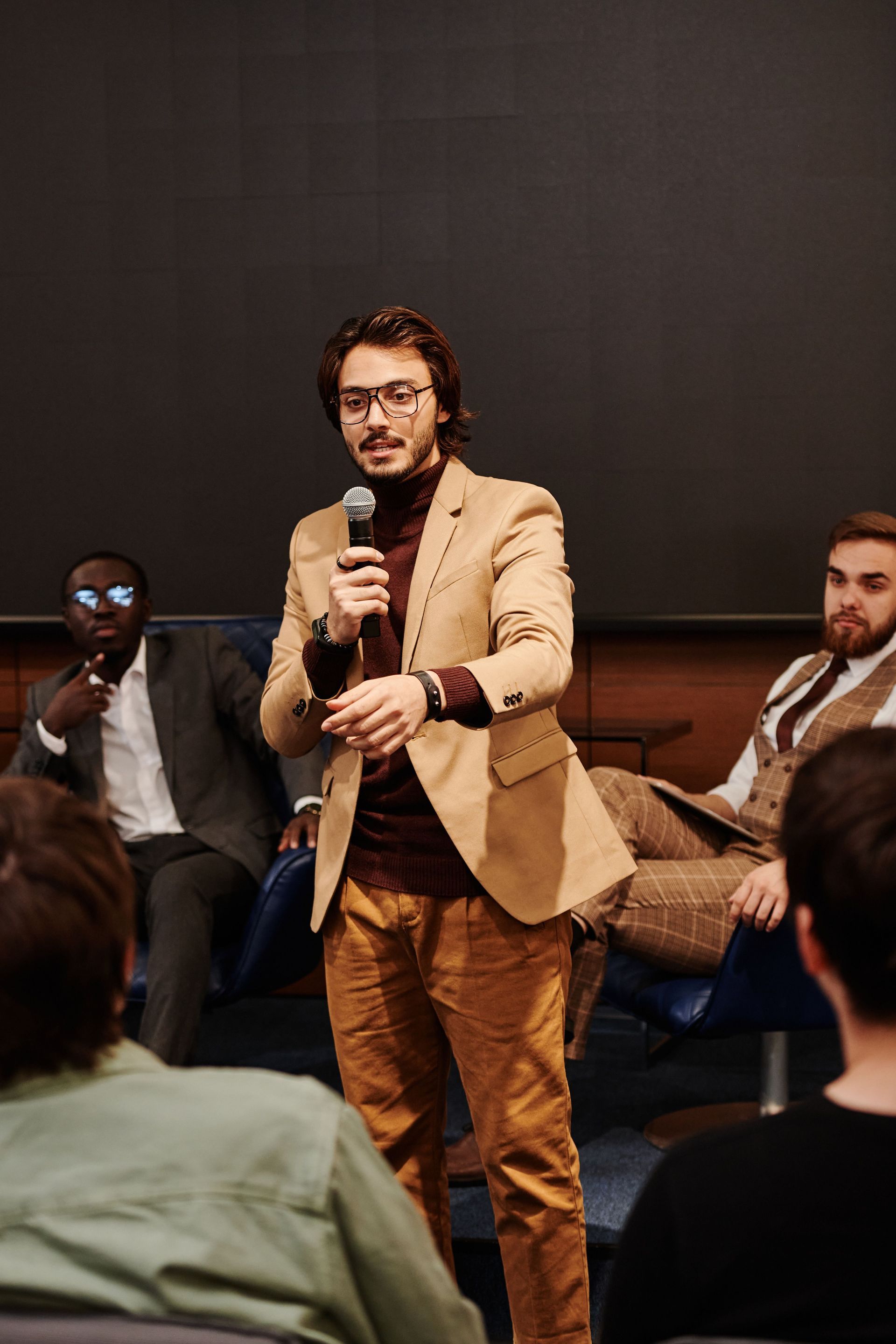man speaking to a crowd