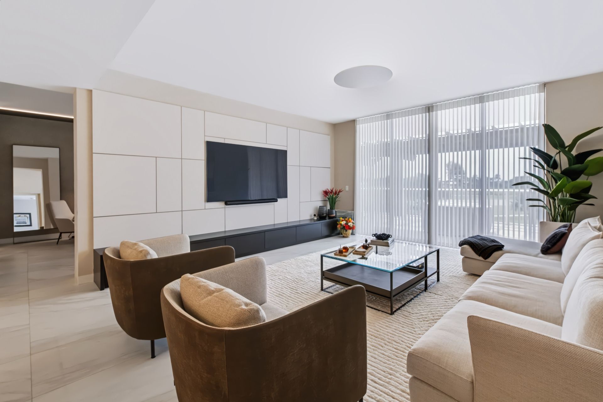 Living room with custom entertainment wall, Barbakoff Residence at Alina Residences, Boca Raton