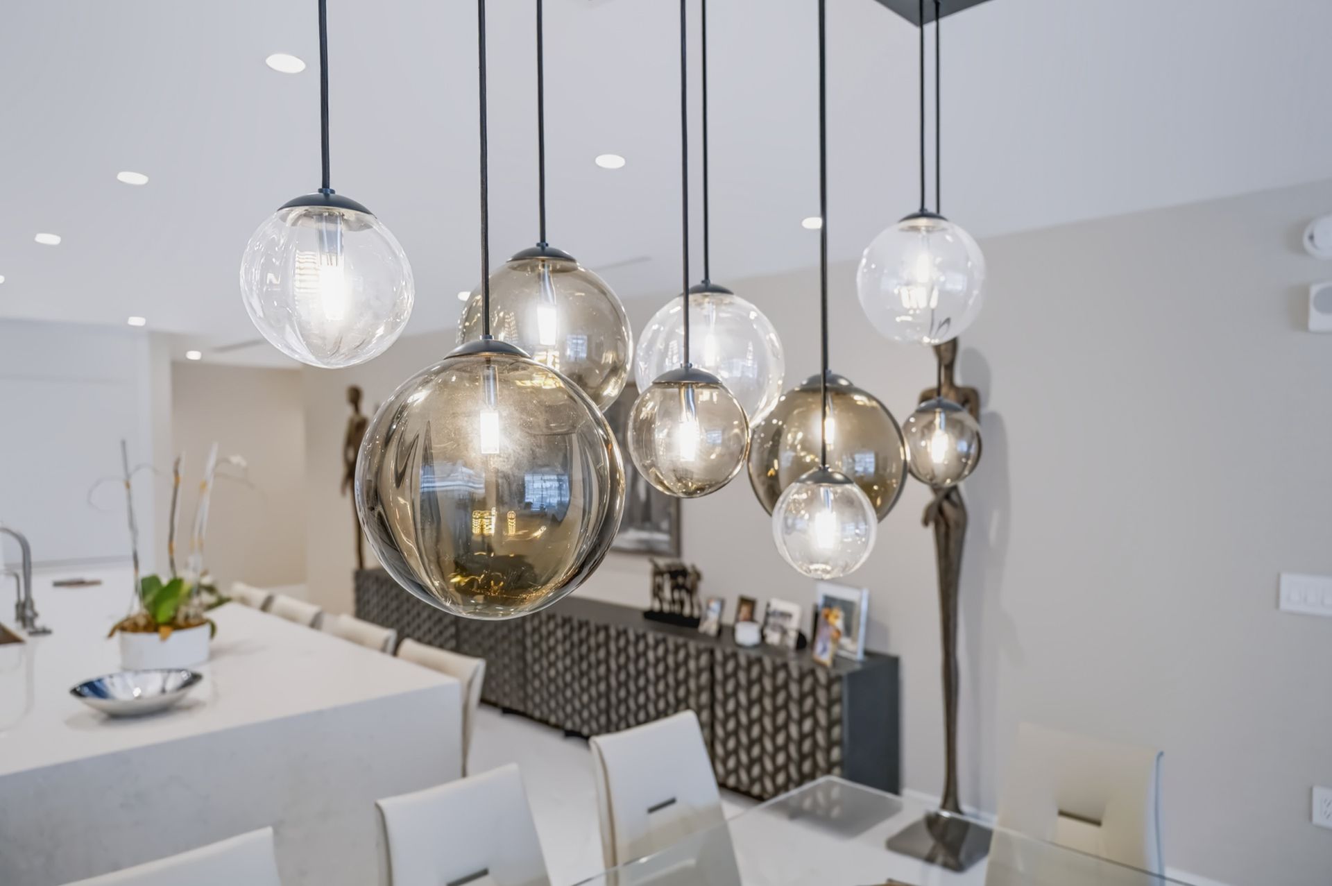 Dining room with glass pendant chandelier, Barbakoff Residence at Alina Residences, Boca Raton