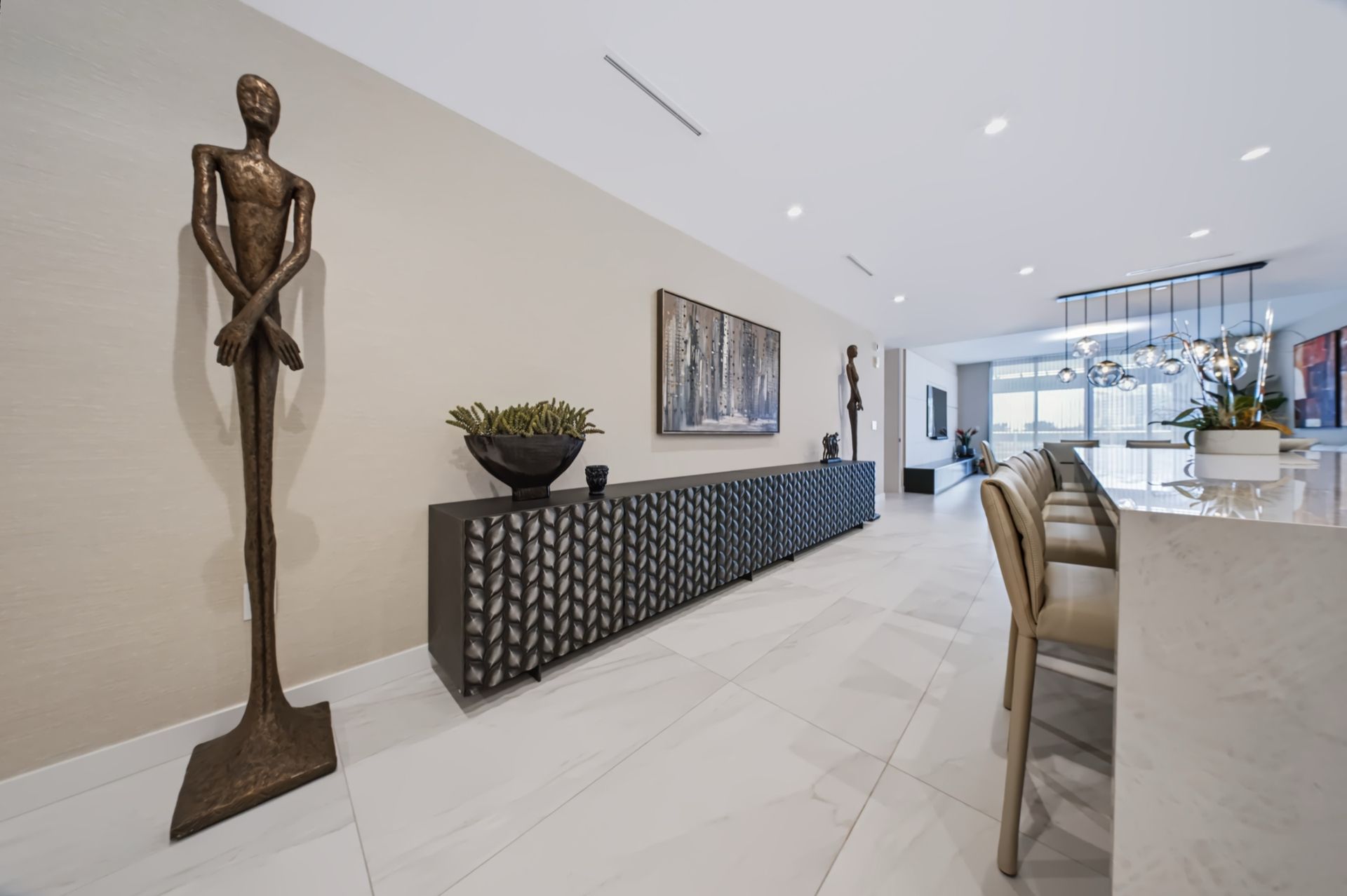 Elevator hall with sculptural black console, Barbakoff Residence at Alina Residences, Boca Raton