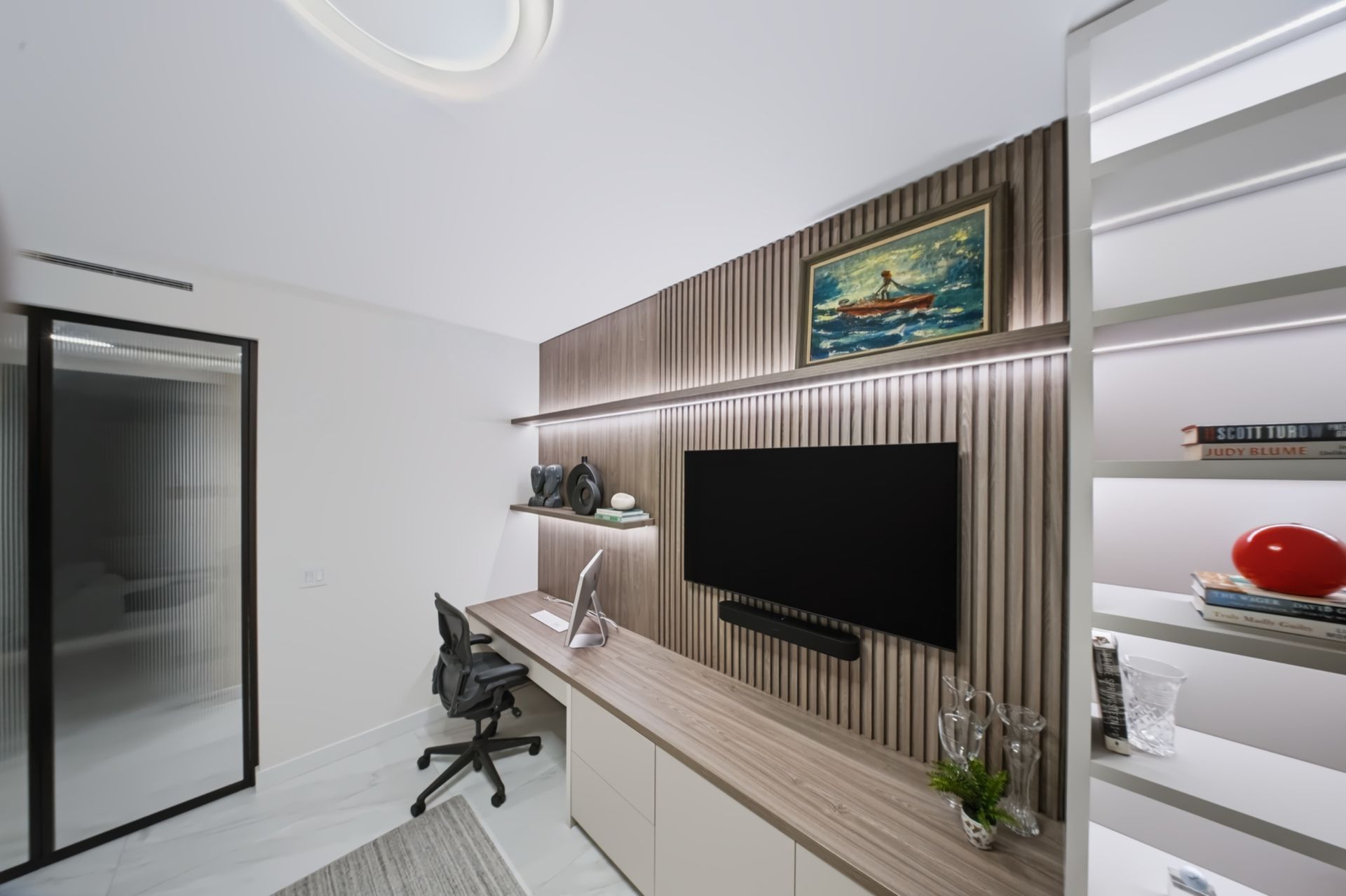Home office with walnut slatted wall and illuminated shelving, Barbakoff Residence at Alina Residences, Boca Raton