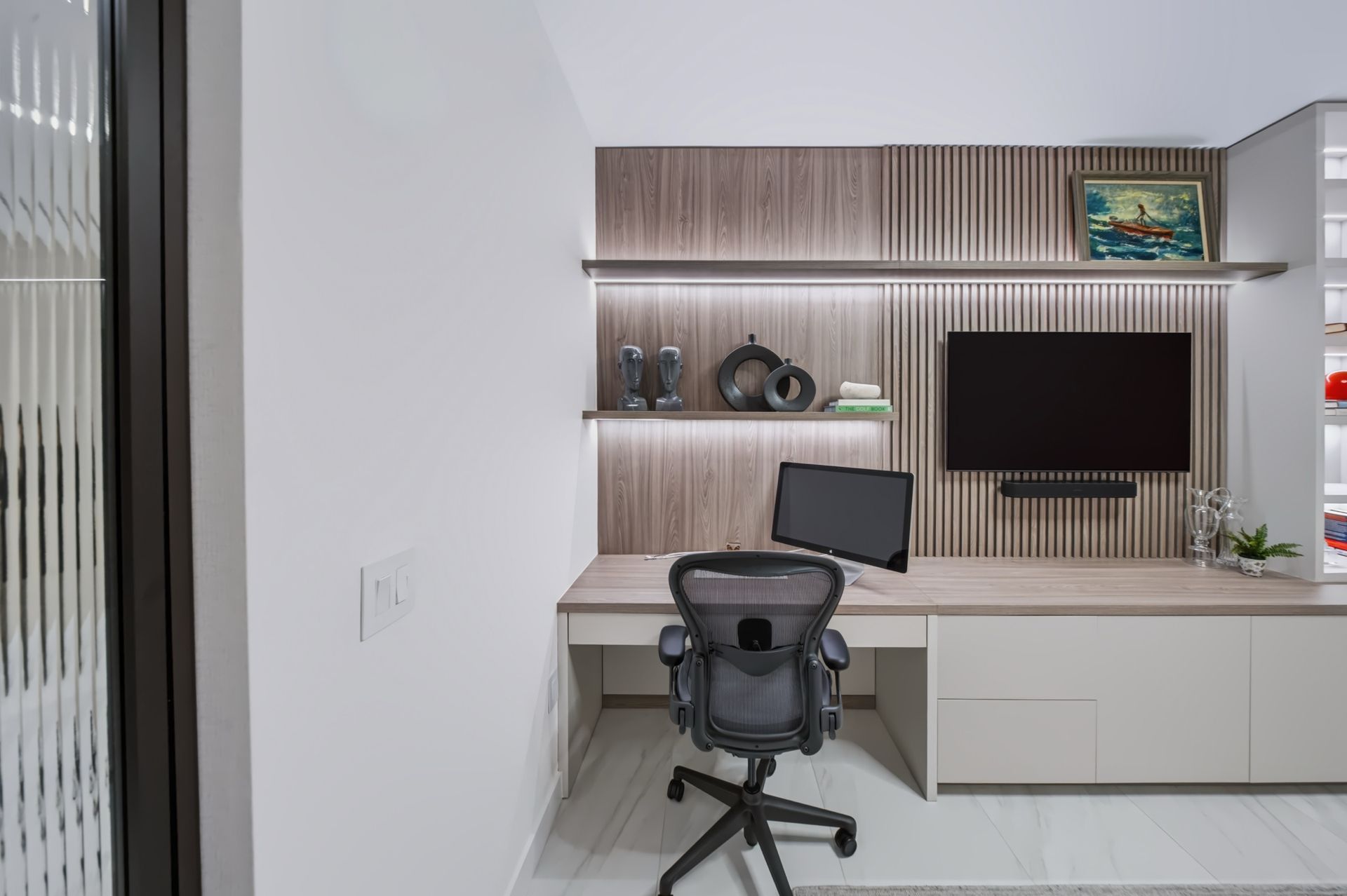 Home office with walnut slatted wall and illuminated shelving, Barbakoff Residence at Alina Residences, Boca Raton