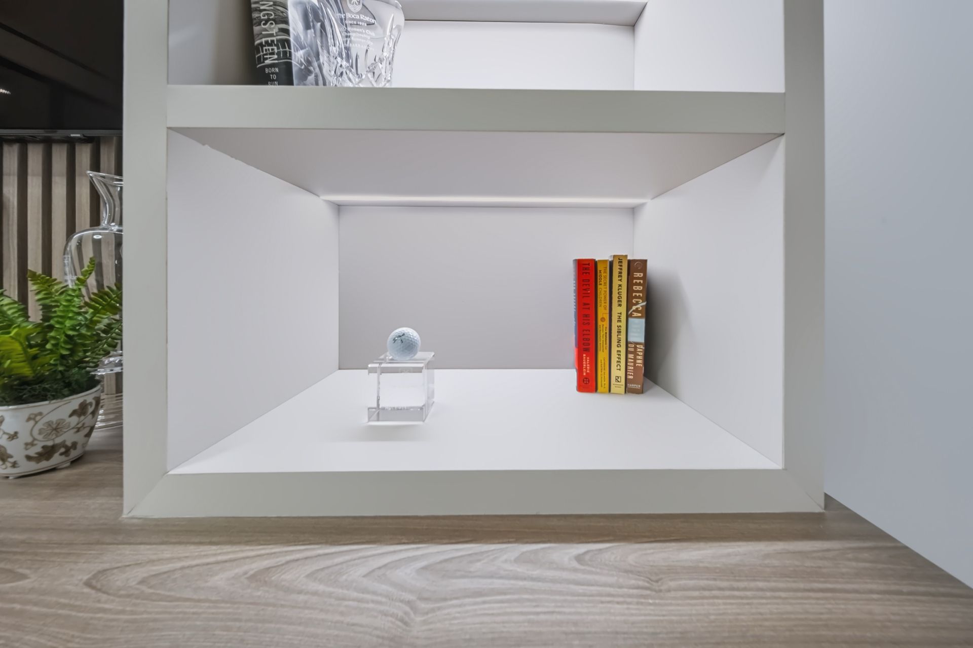 Home office with walnut slatted wall and illuminated shelving, Barbakoff Residence at Alina Residences, Boca Raton