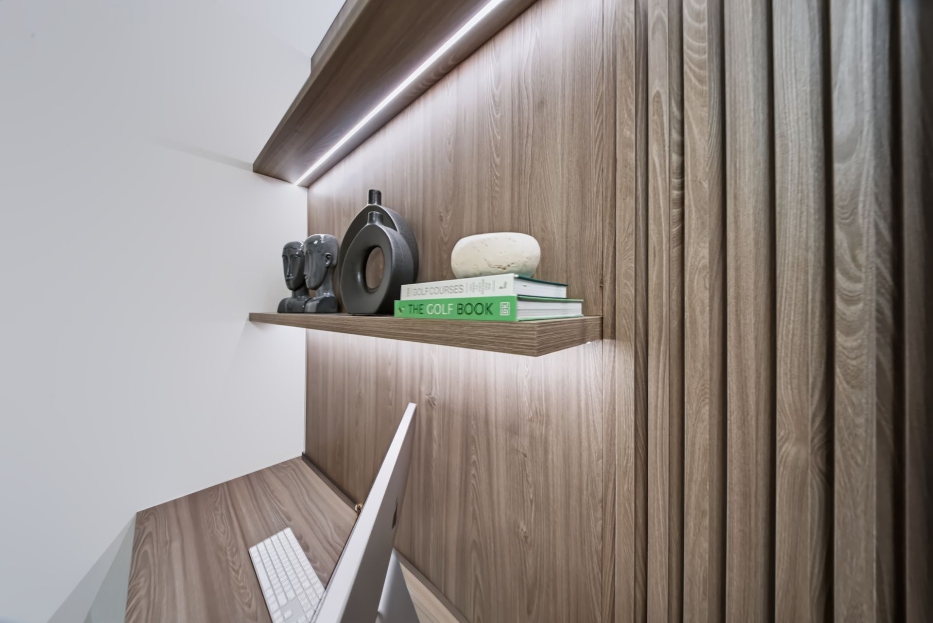 Home office with walnut slatted wall and illuminated shelving, Barbakoff Residence at Alina Residences, Boca Raton