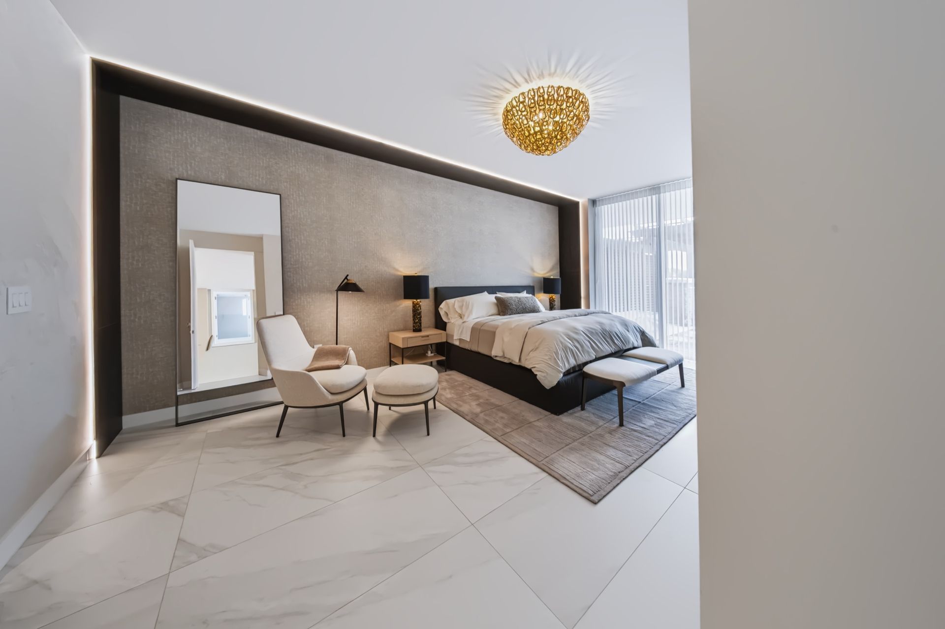 Primary bedroom with textured accent wall, Barbakoff Residence at Alina Residences, Boca Raton