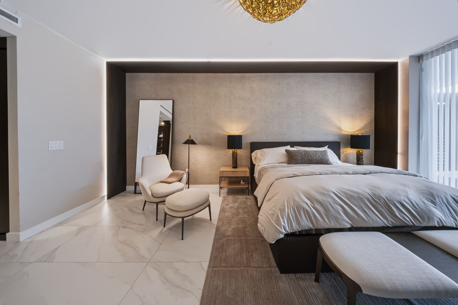 Primary bedroom with textured accent wall, Barbakoff Residence at Alina Residences, Boca Raton