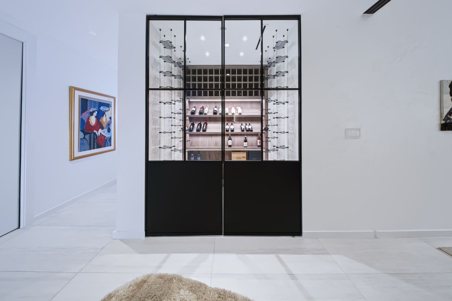 Glass wine room with black ADL doors, Finn Residence at Alina Residences, Boca Raton