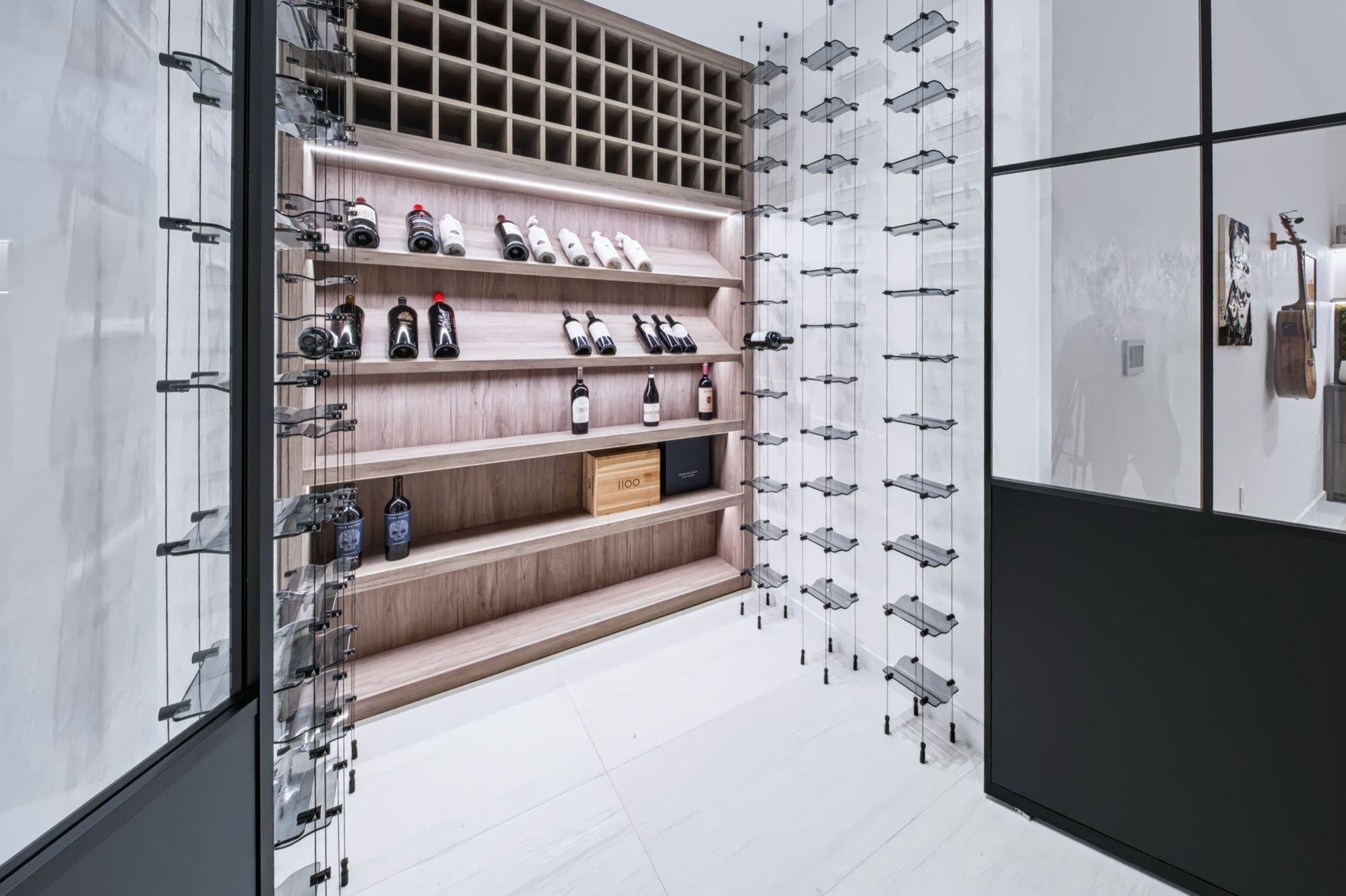 Glass wine room with black ADL doors, Finn Residence at Alina Residences, Boca Raton