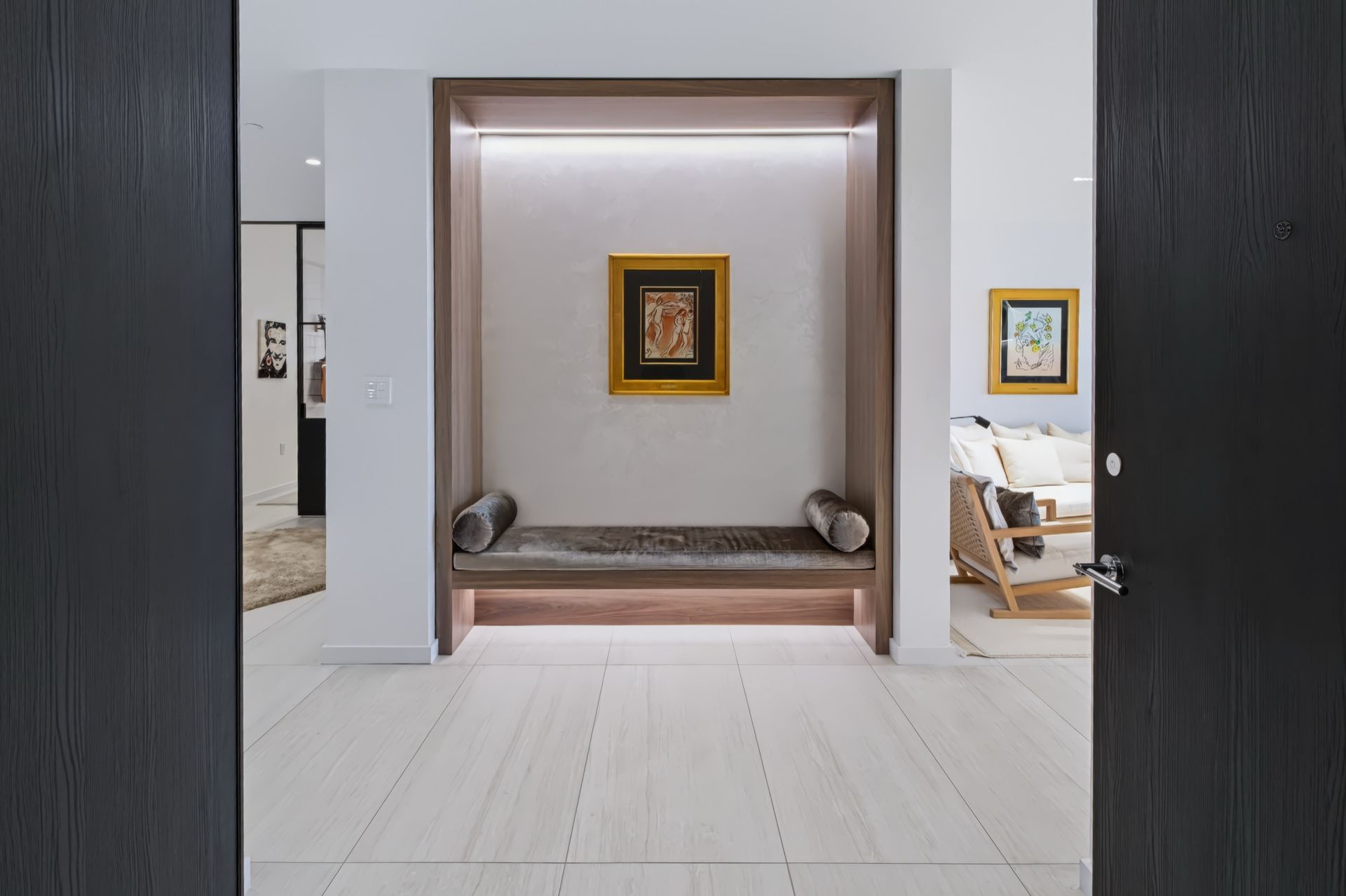 Entry with lit oak niche and bench, Finn Residence at Alina Residences, Boca Raton