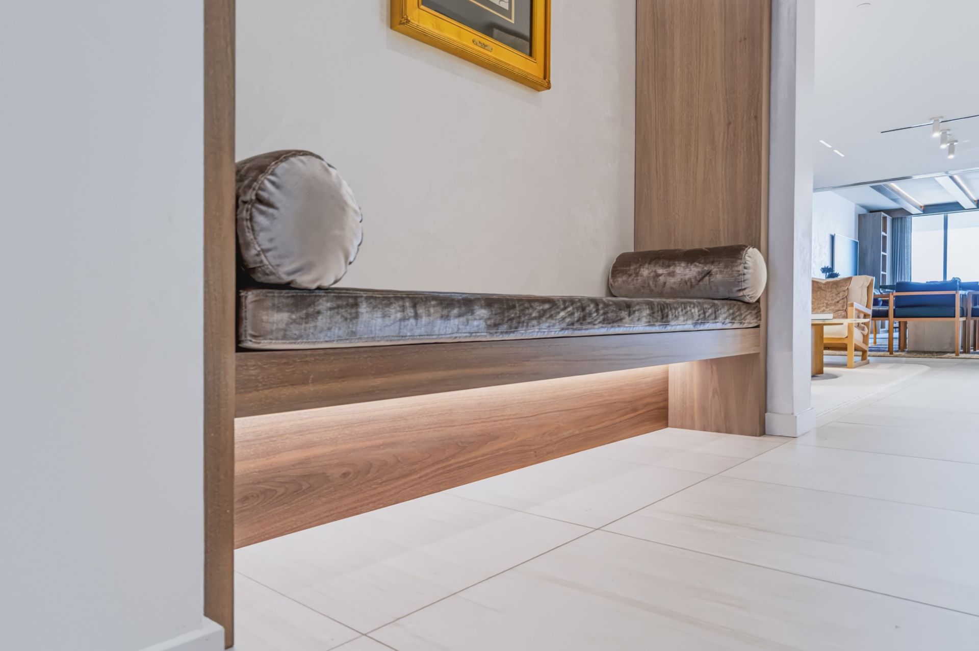 Entry with lit oak niche and bench, Finn Residence at Alina Residences, Boca Raton