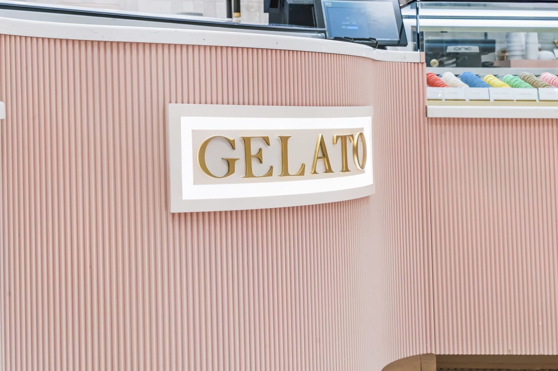 Fluted rose gelato counter with arched display shelving, Maison Rose at The Boca Raton