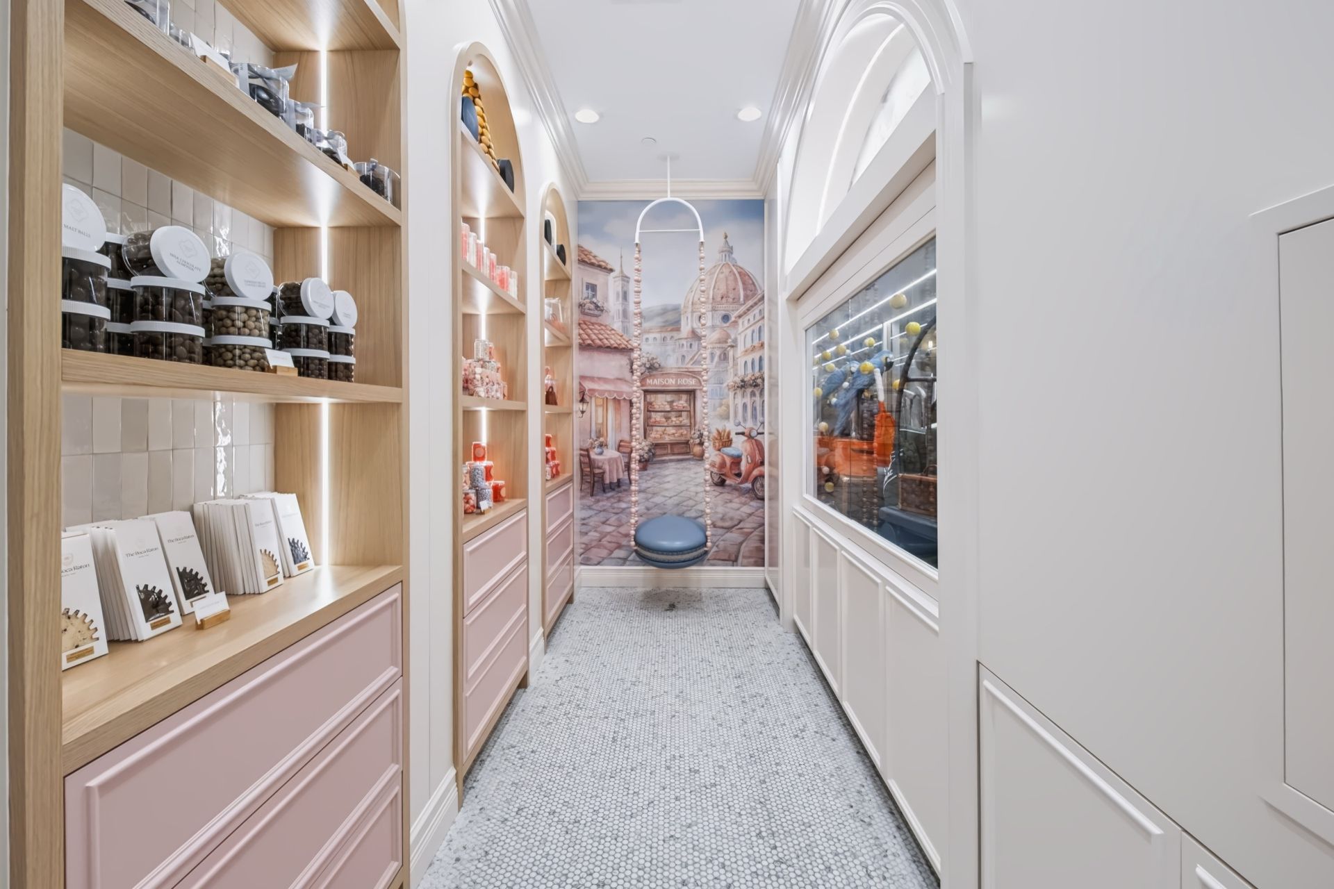 Arched boutique shelving with integrated lighting, Maison Rose at The Boca Raton