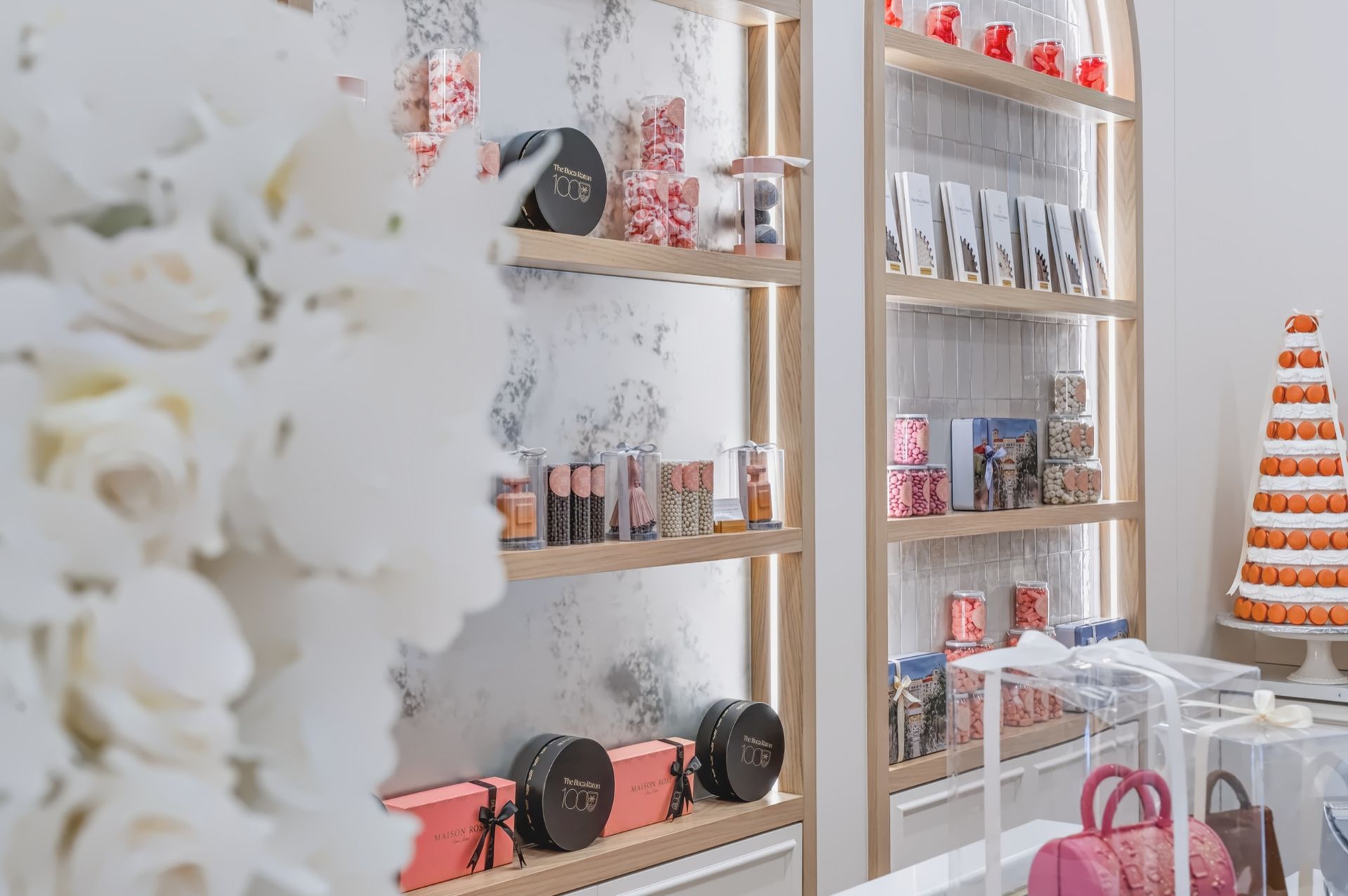 Arched boutique shelving with integrated lighting, Maison Rose at The Boca Raton