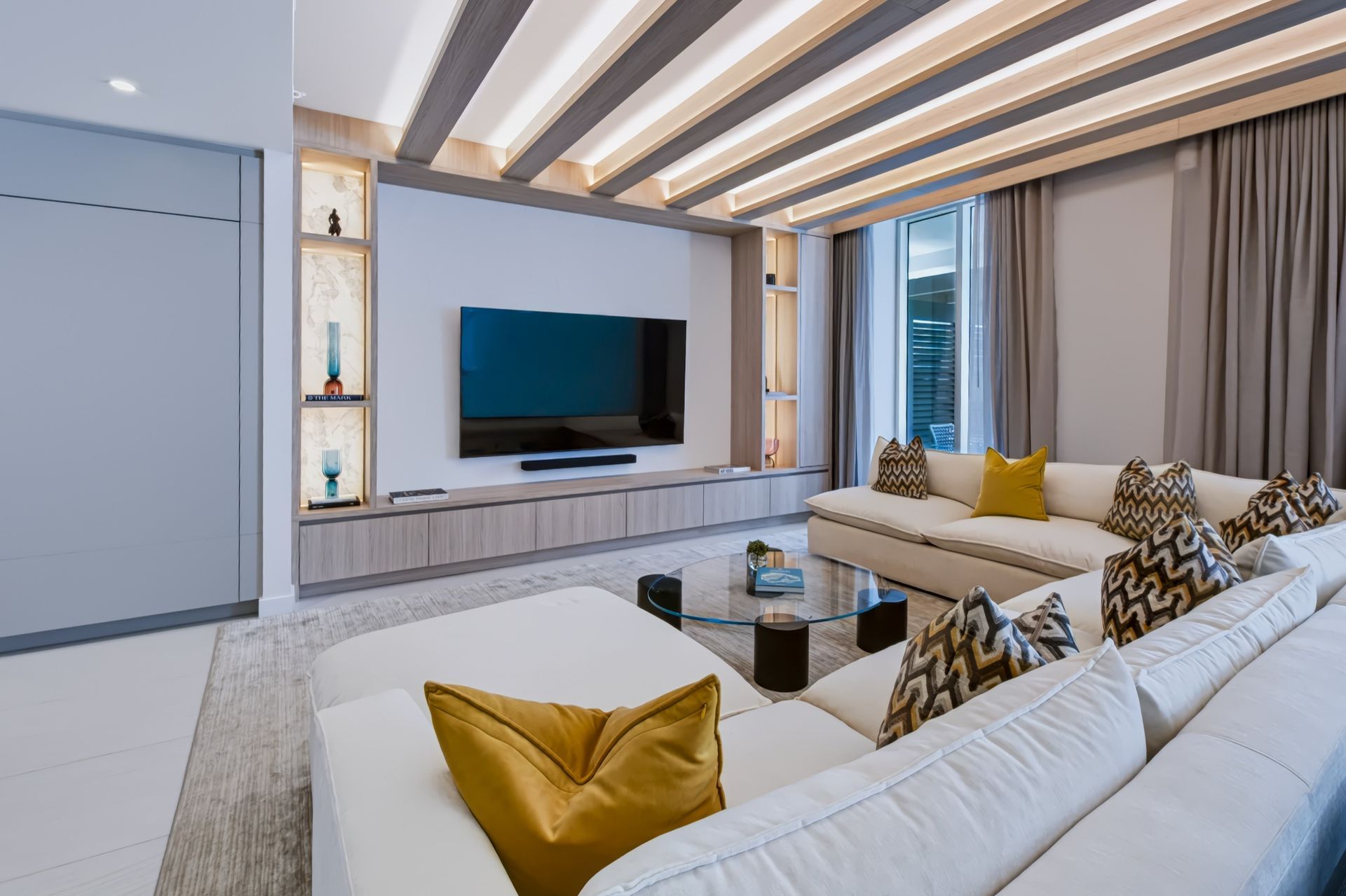 Living room with oak ceiling beams and integrated LED lighting, Streinger Residence at Alina Residences, Boca Raton