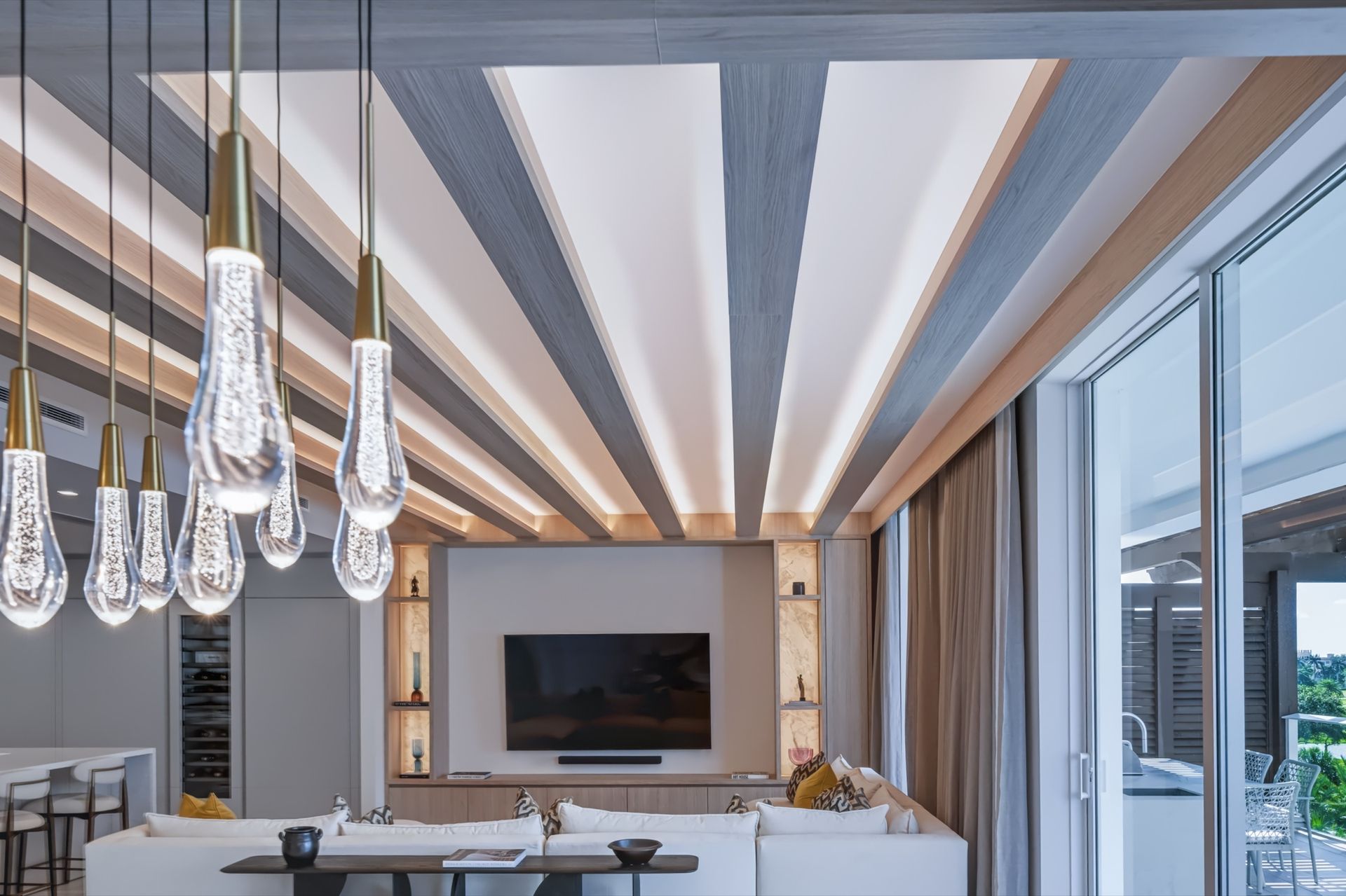 Living room with oak ceiling beams and integrated LED lighting, Streinger Residence at Alina Residences, Boca Raton