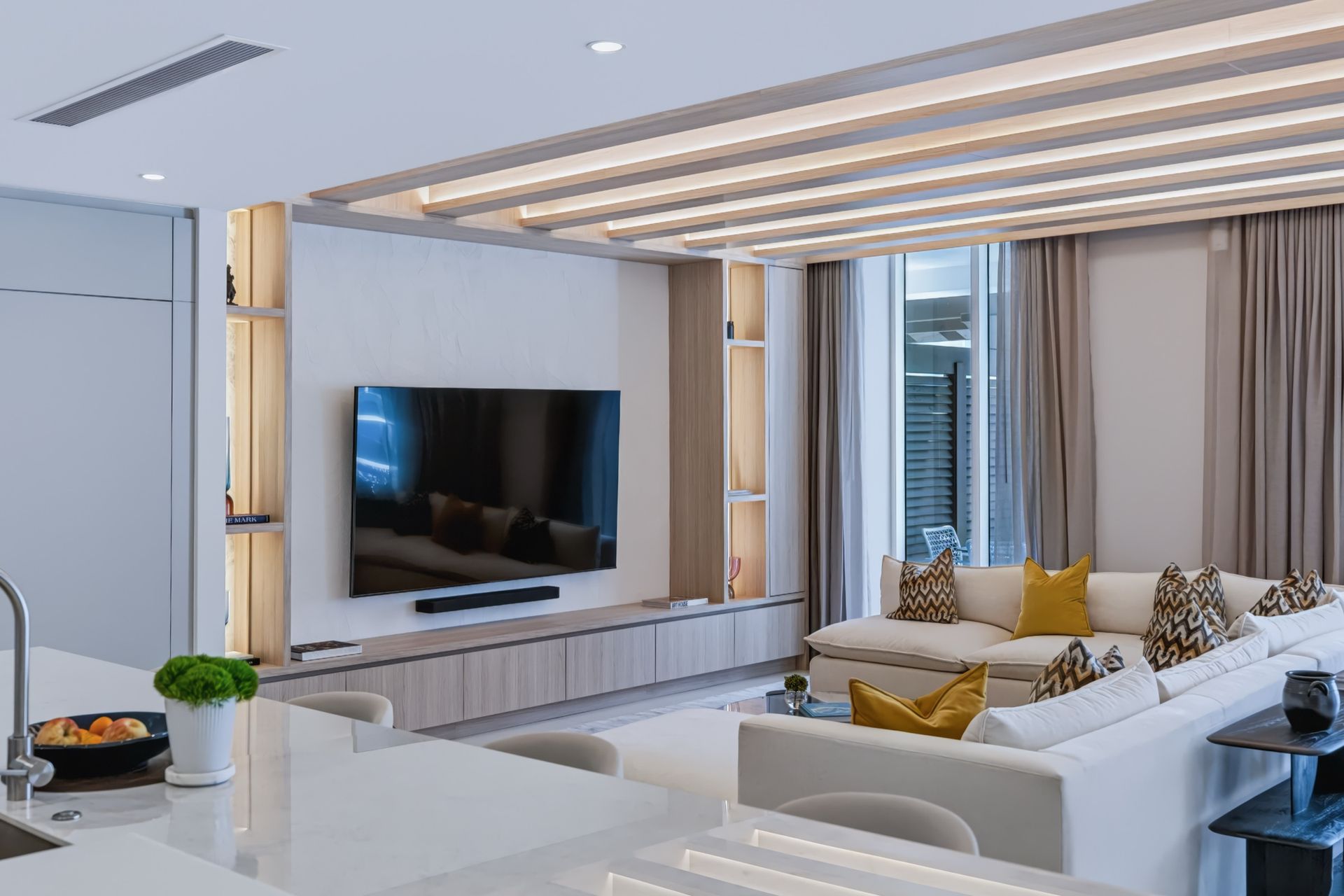 Living room with oak ceiling beams and integrated LED lighting, Streinger Residence at Alina Residences, Boca Raton