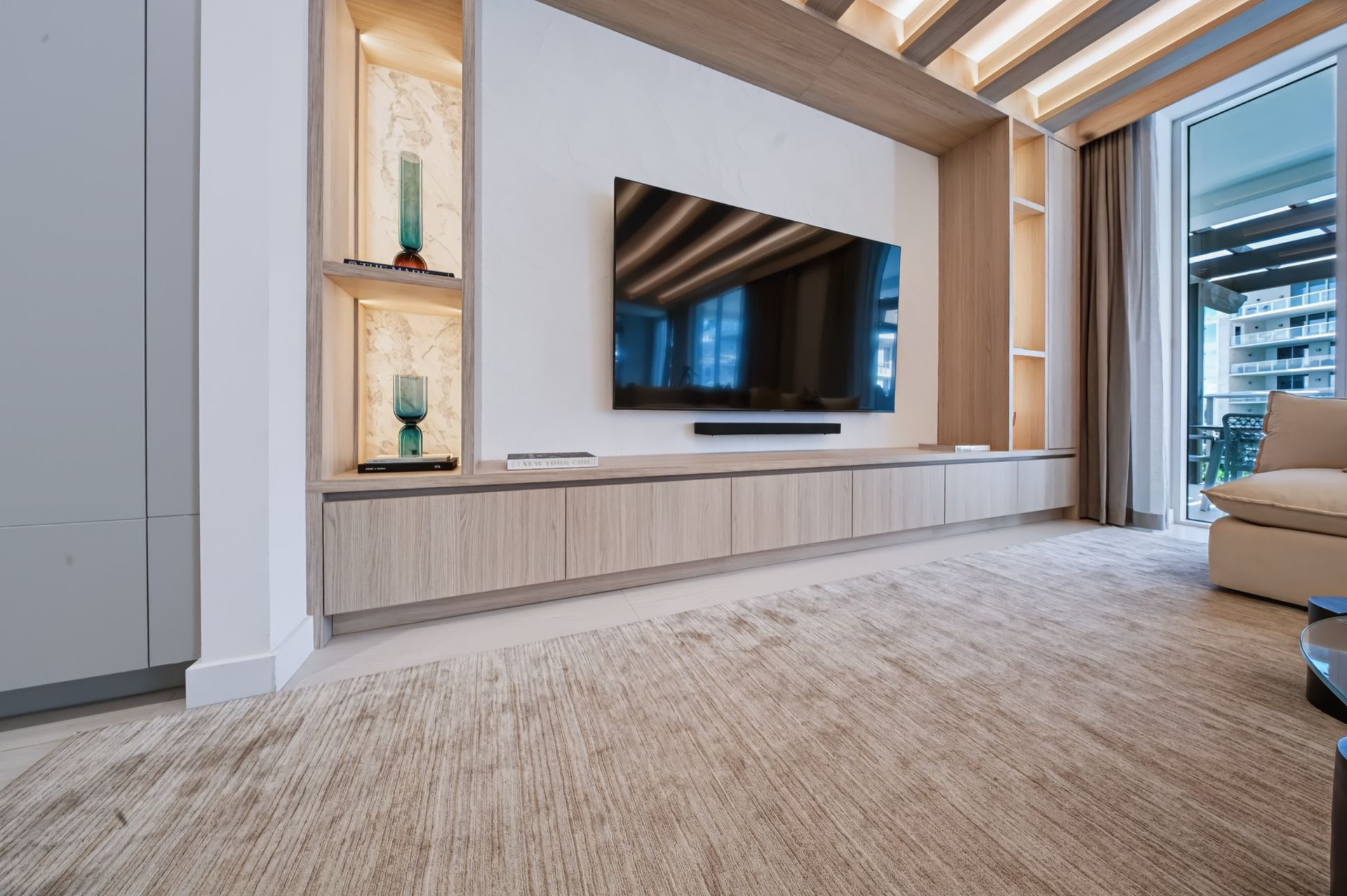 Entertainment wall with Calacatta Milano marble niches, Streinger Residence at Alina Residences, Boca Raton