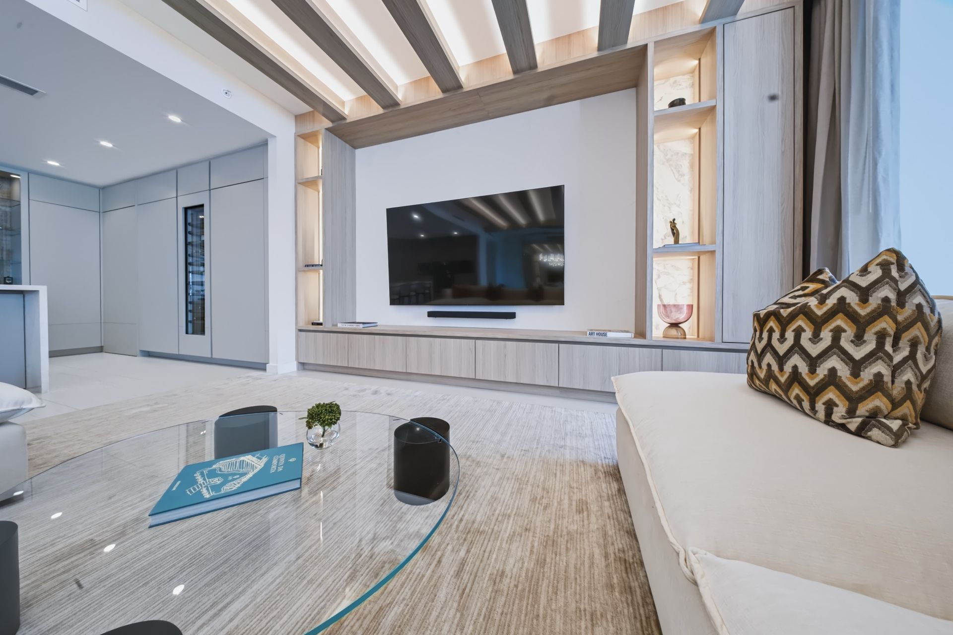 Entertainment wall with Calacatta Milano marble niches, Streinger Residence at Alina Residences, Boca Raton
