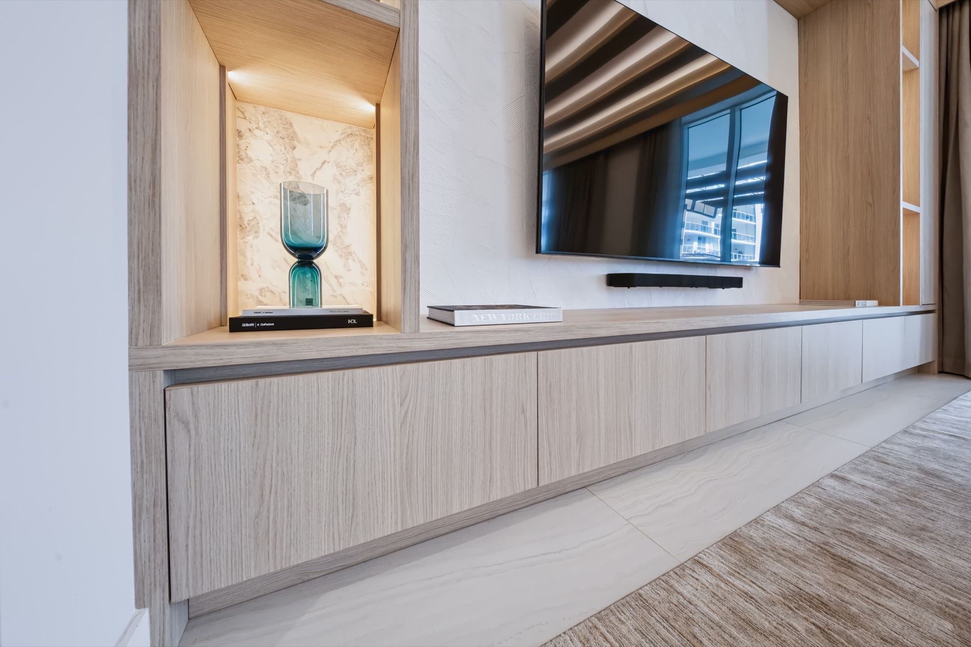 Entertainment wall with Calacatta Milano marble niches, Streinger Residence at Alina Residences, Boca Raton