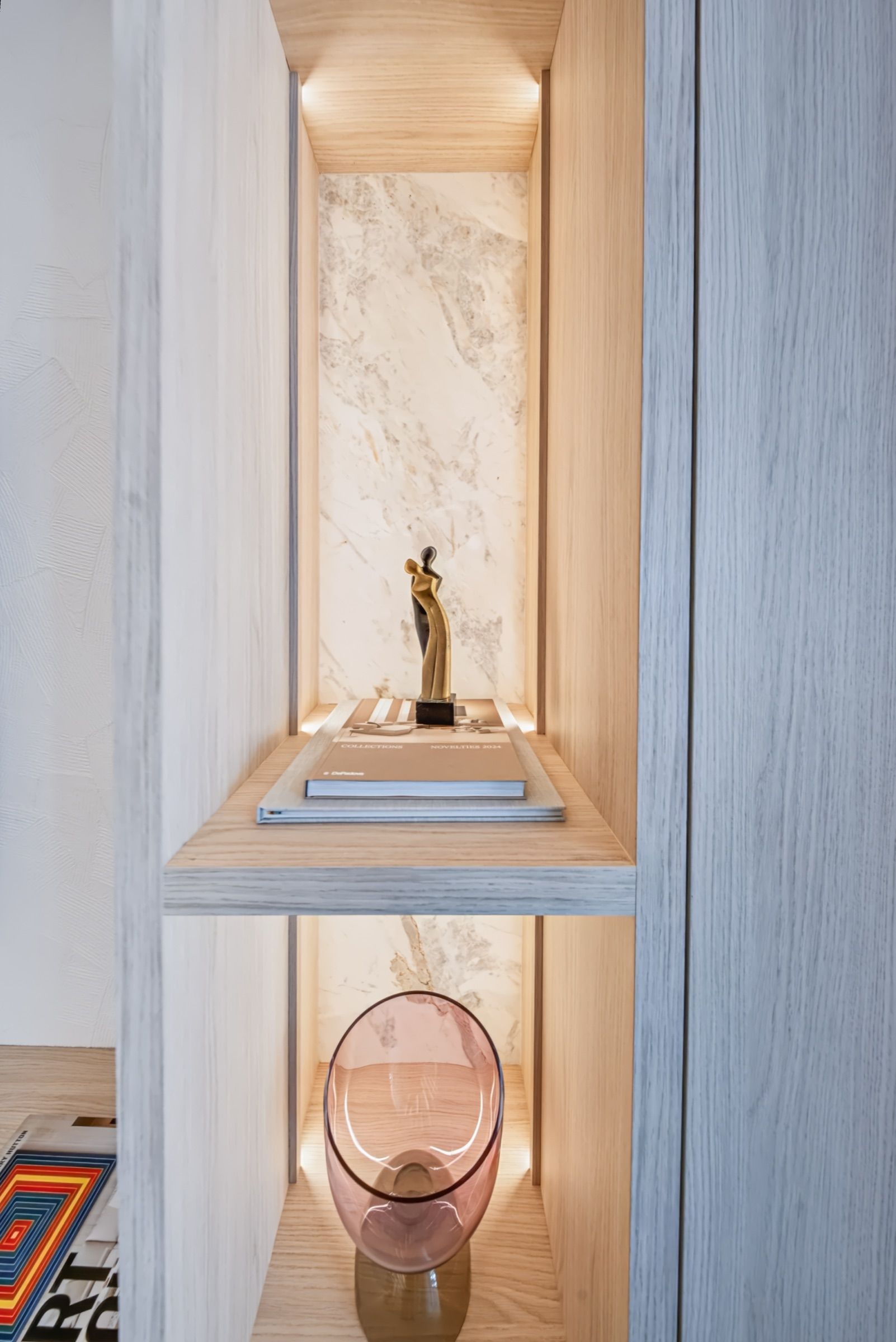 Entertainment wall with Calacatta Milano marble niches, Streinger Residence at Alina Residences, Boca Raton