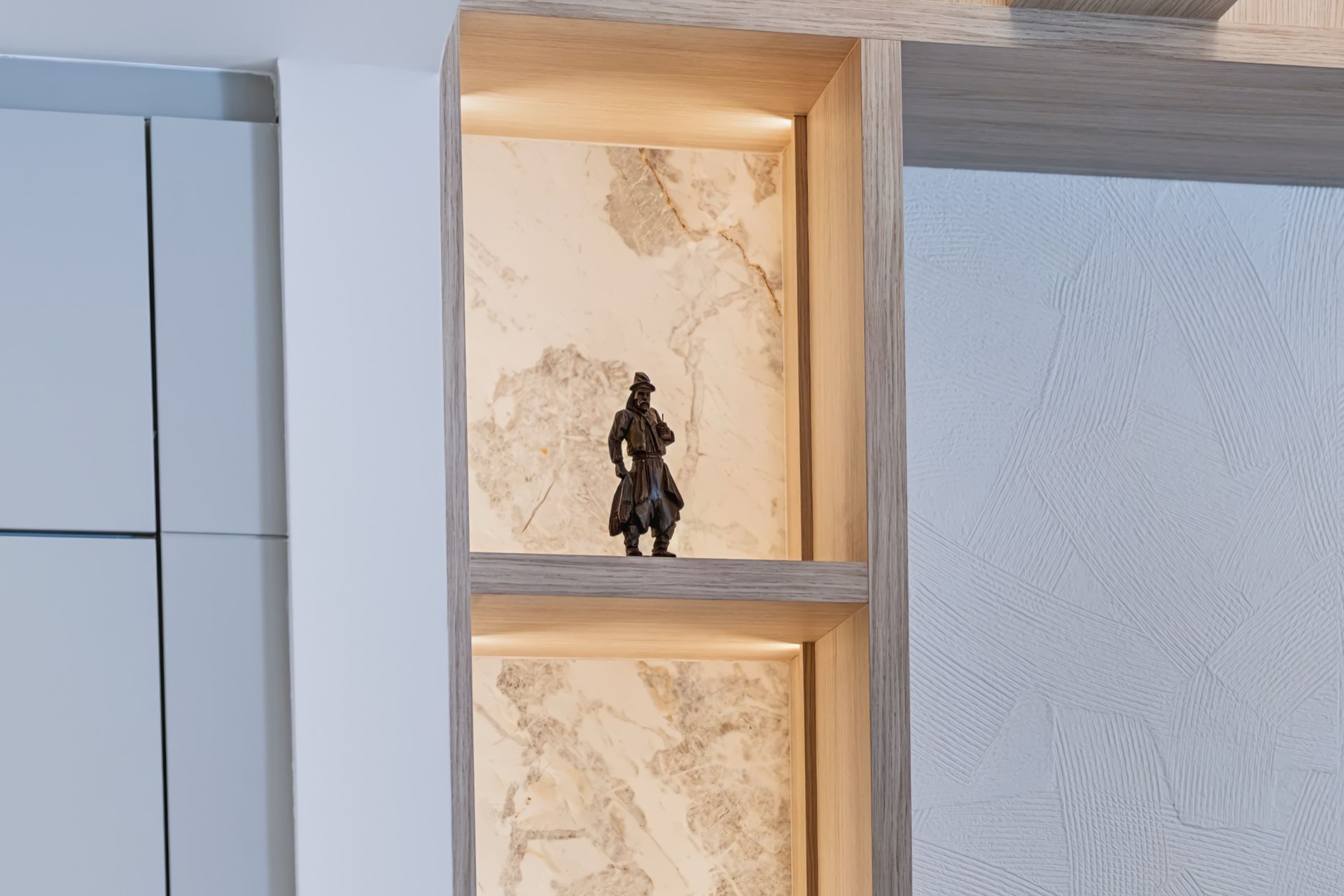 Entertainment wall with Calacatta Milano marble niches, Streinger Residence at Alina Residences, Boca Raton