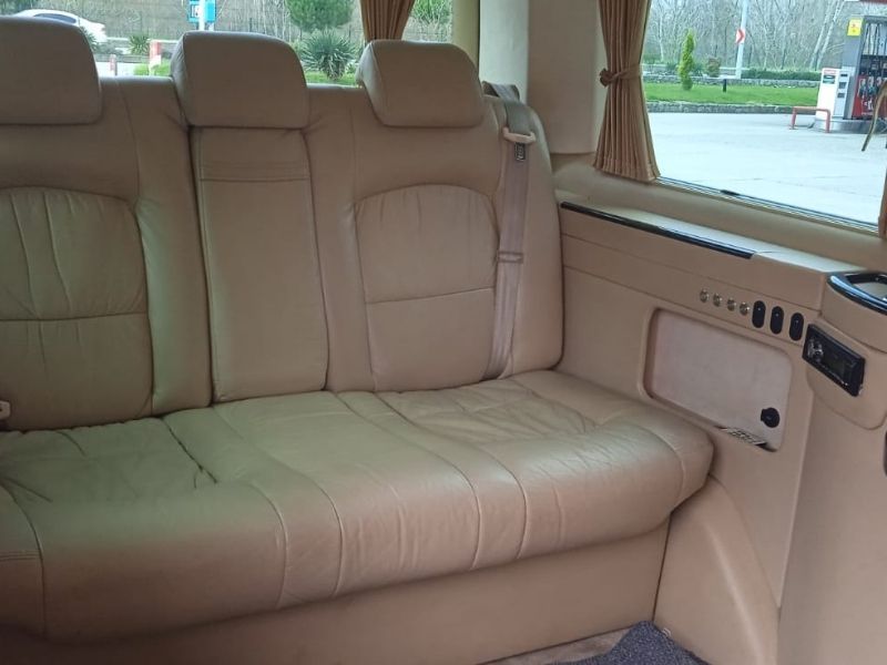 Volkswagen Caravelle Standard Budget Van interior back seats