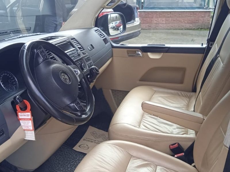 Volkswagen Caravelle Standard Budget Van driver cabin