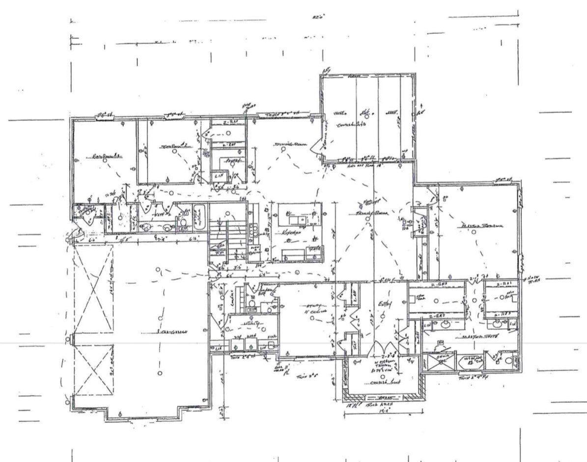 A black and white architectural floor plan of a residential home, detailing room layouts, doorways, and structural walls.