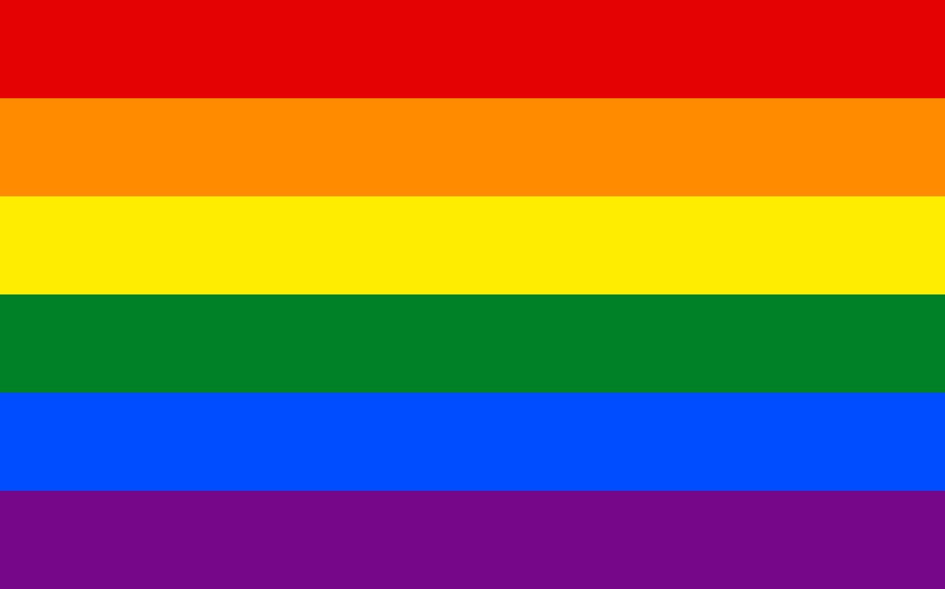 Rainbow pride flag with six horizontal stripes: red, orange, yellow, green, blue, and purple.