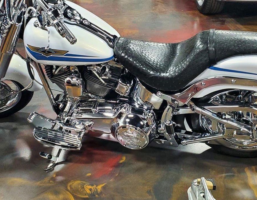 A harley davidson motorcycle is parked in a garage
