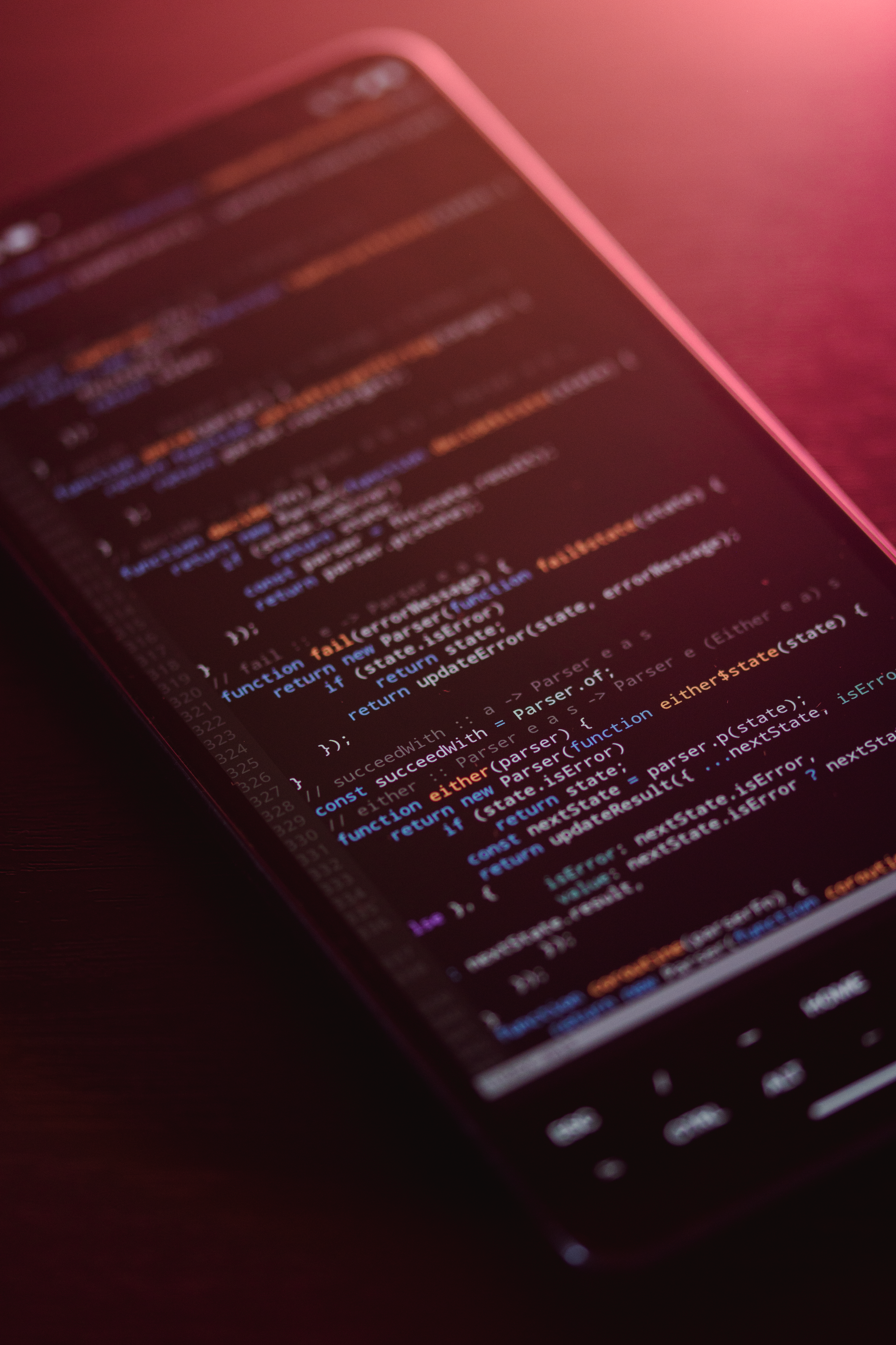 Illustration of responsive web design with devices and floating PHP, JS, HTML, Python, and CSS icons