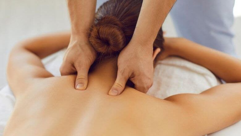 A Person Receiving a Back Massage — Leela Thai Massage & Spa in Newtown, QLD