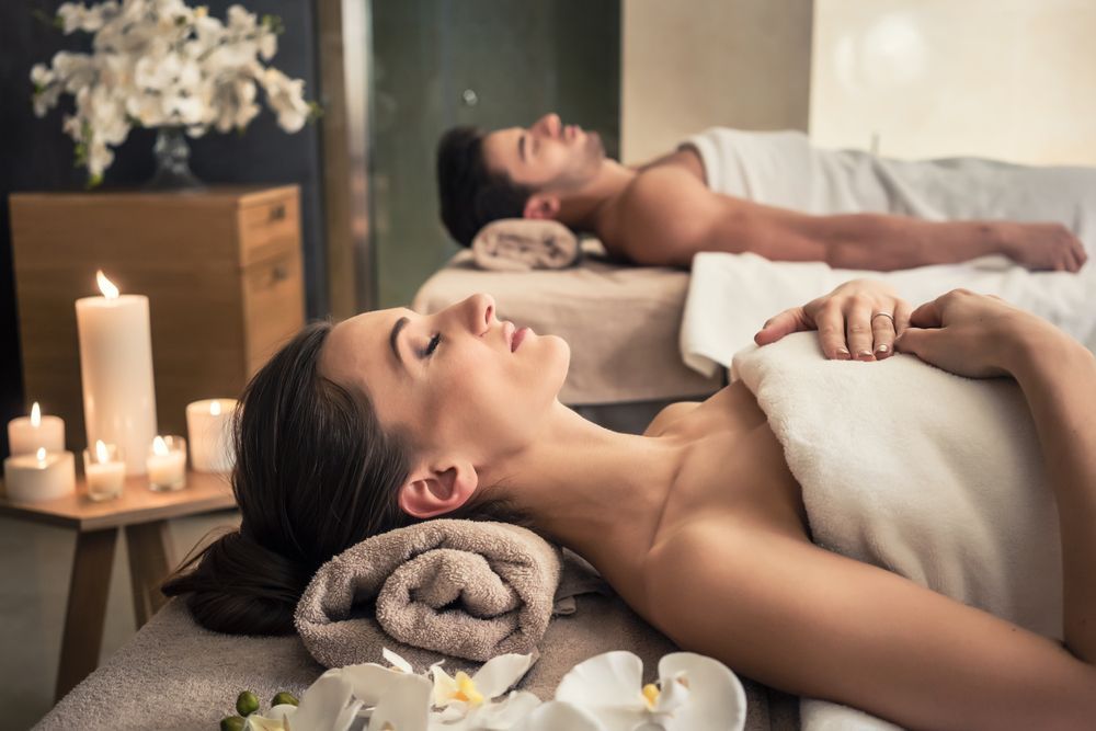 Couple Relaxing at a Spa, Lying on Massage Tables — Leela Thai Massage & Spa in Newtown, QLD