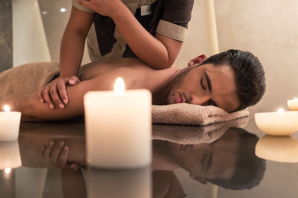 Man Receiving a Back Massage in a Spa — Leela Thai Massage & Spa in Newtown, QLD