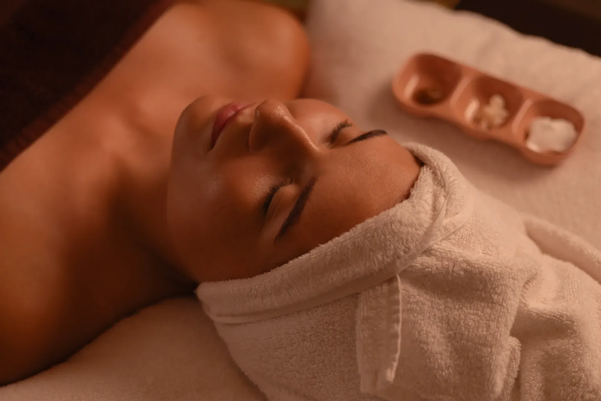 Hands Massaging a Person's Neck and Upper Back — Leela Thai Massage & Spa in Newtown, QLD