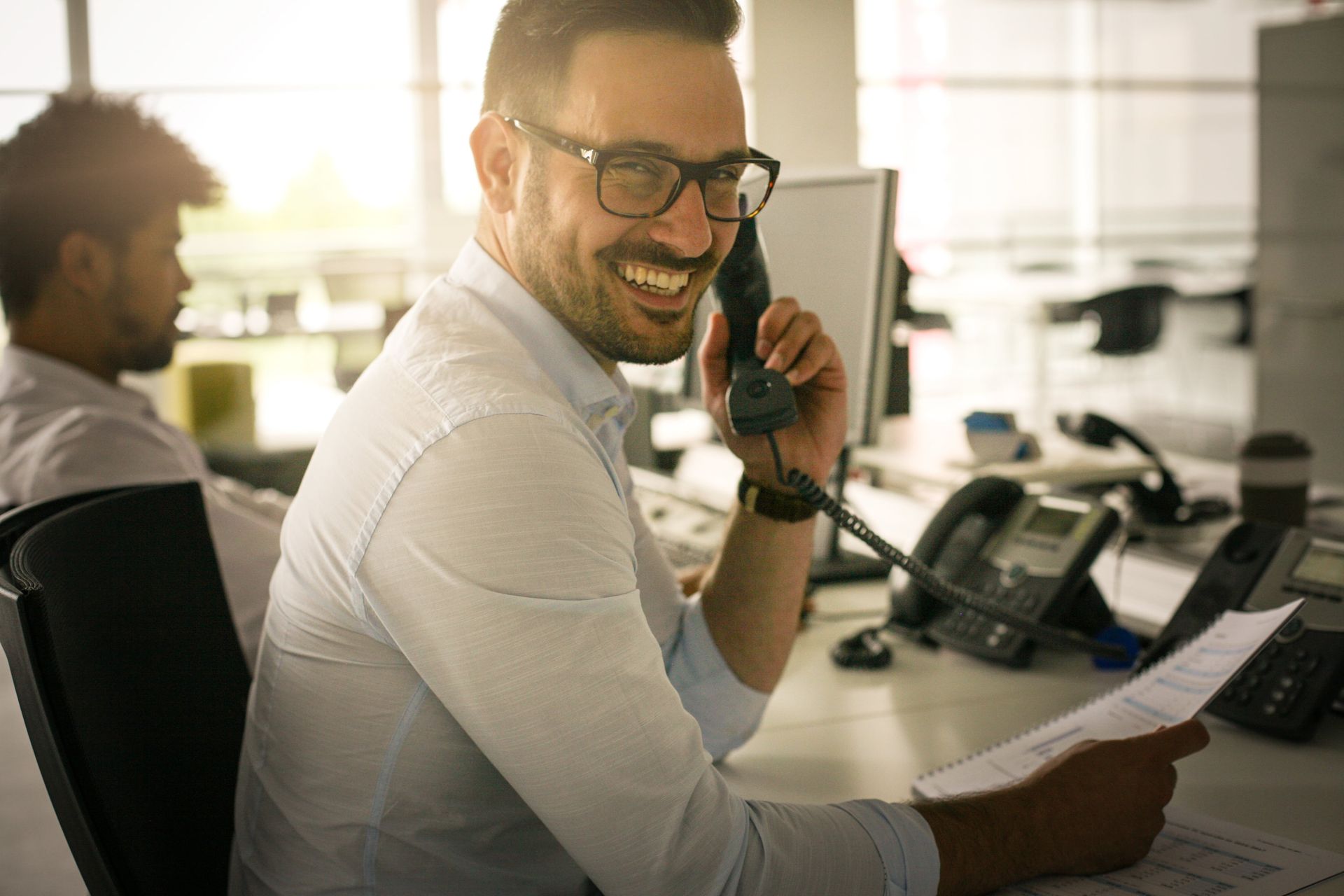 Smiling Man Talking on The Phone