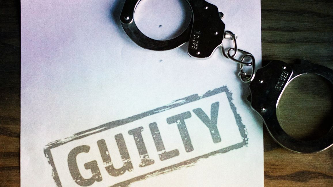 Handcuffs on a paper with a