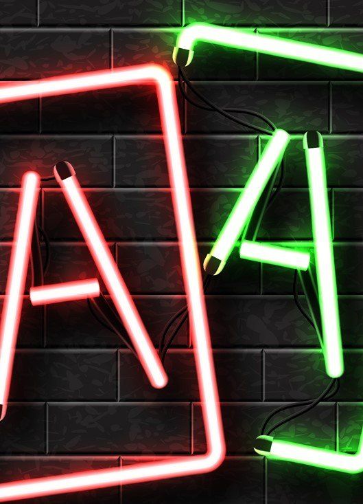 Neon sign that has two aces in the hand.