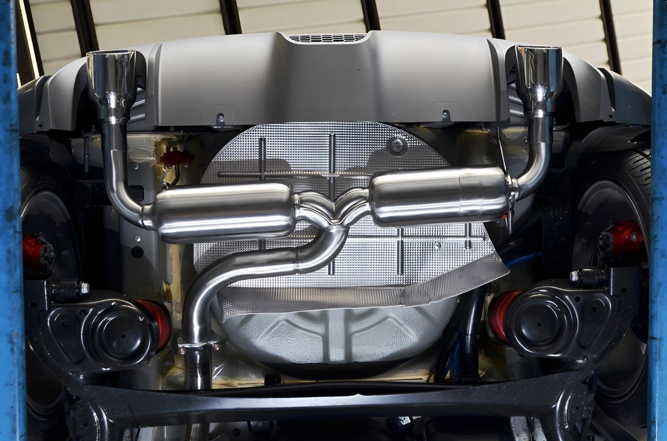 The Exhaust Pipes on the Back of a Car Are Visible — One Stop Service and Suspension Centre In Port Macquarie, NSW