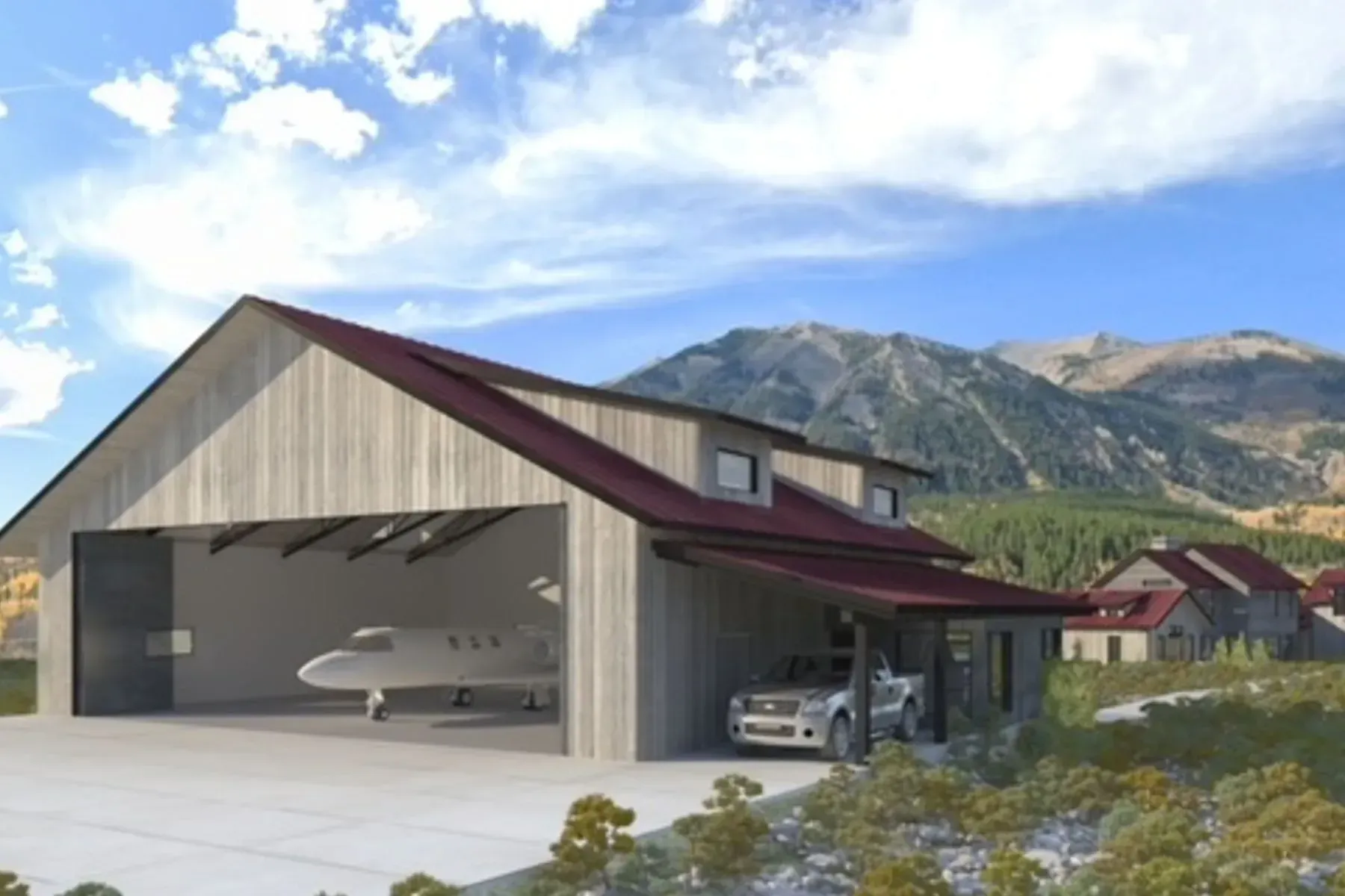Modern house with open garage, small aircraft inside, parked car, and mountain backdrop