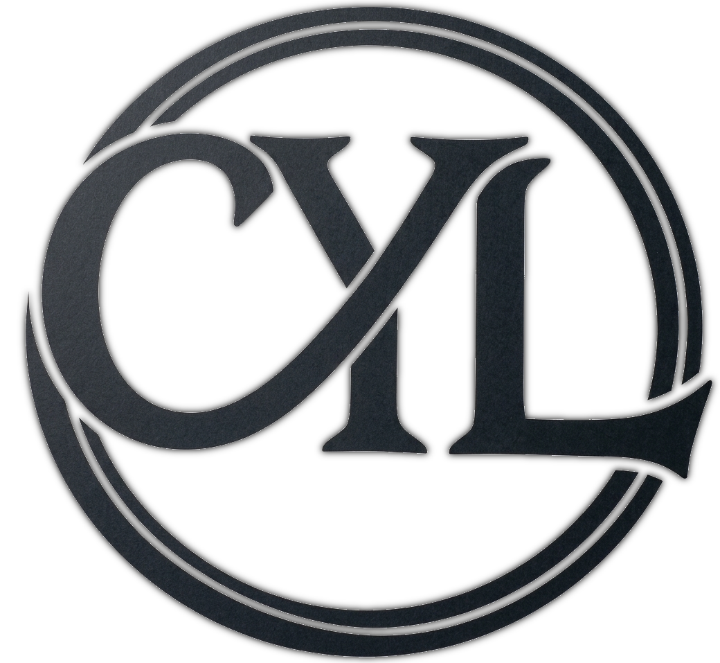 Black stylized CL monogram inside a double circular border on a white background