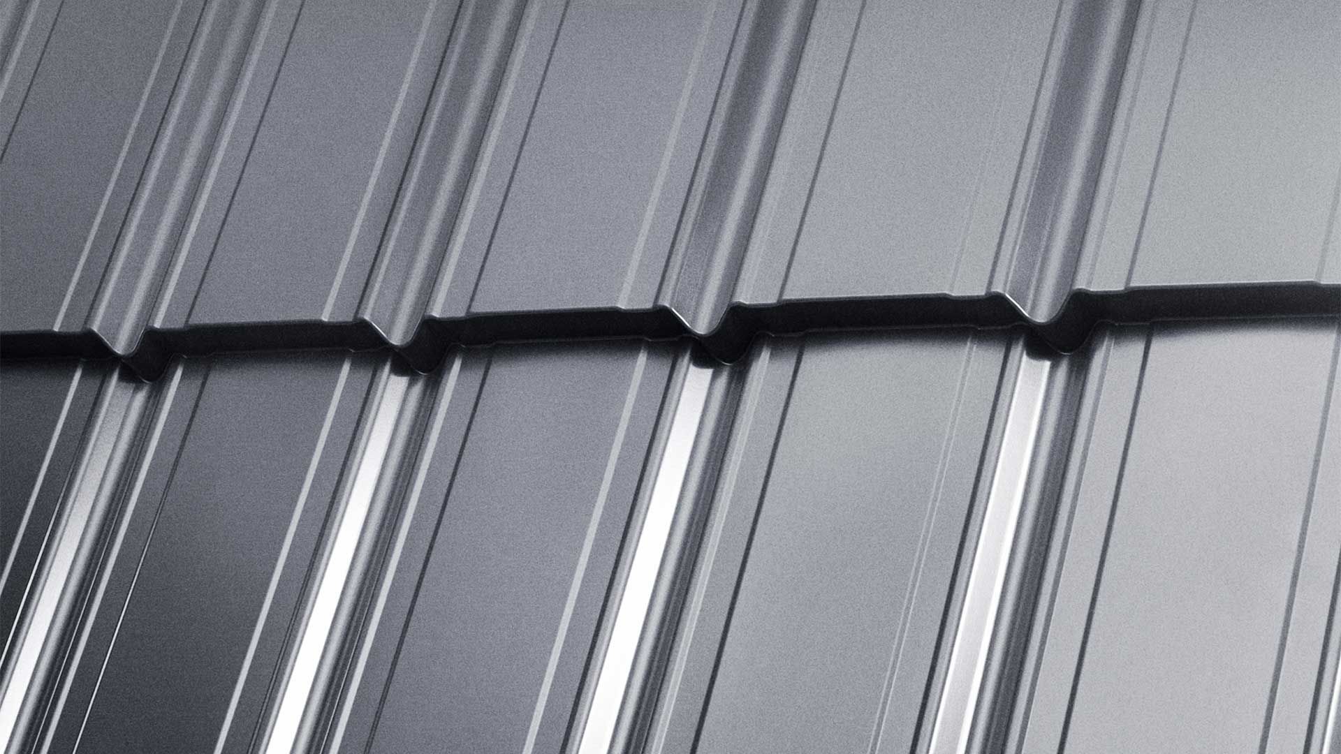 A close up of a gray metal roof
