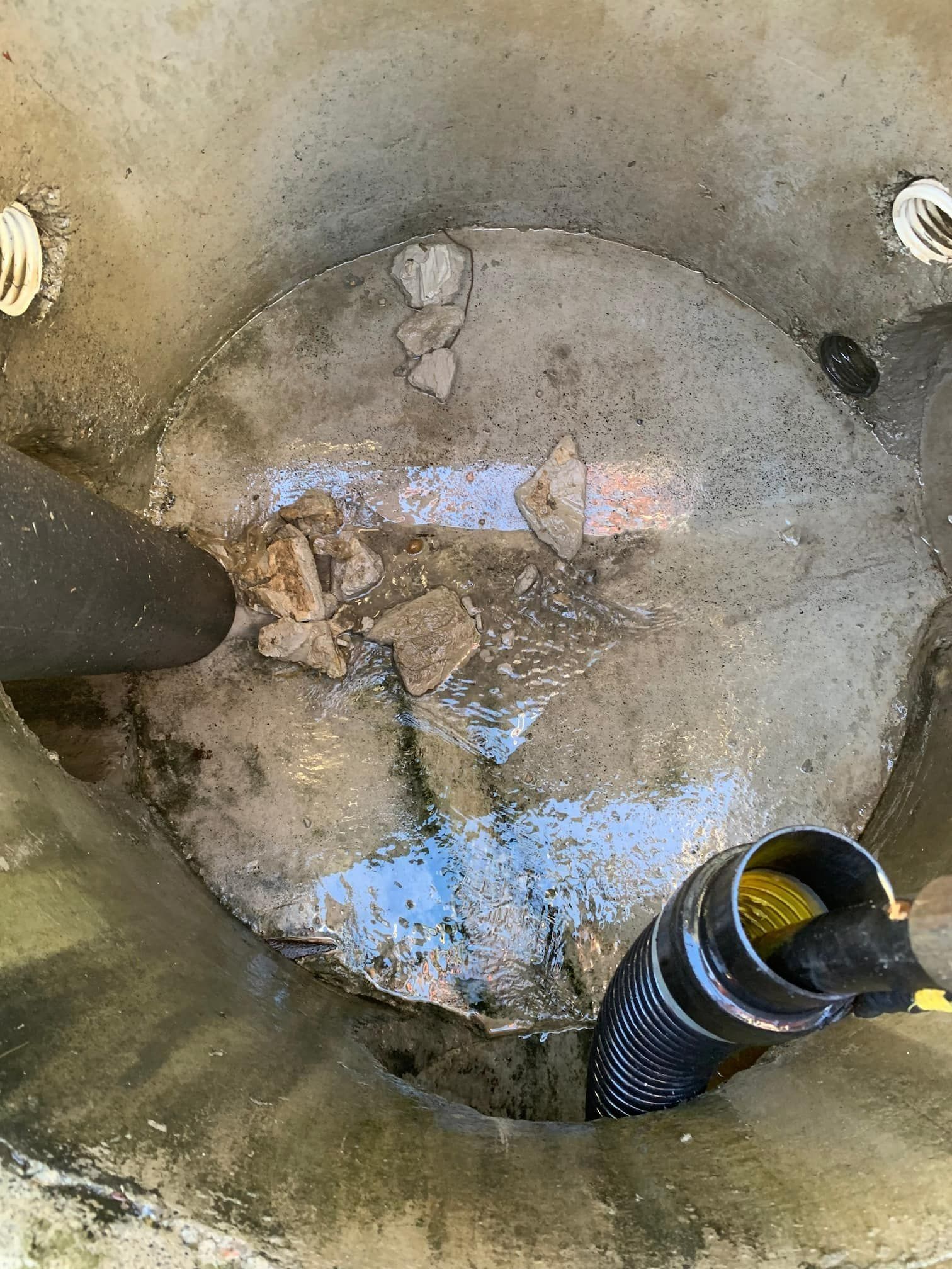 Inside of a Concrete Well With Debris and Water — Tyzac Group in Beerwah, QLD