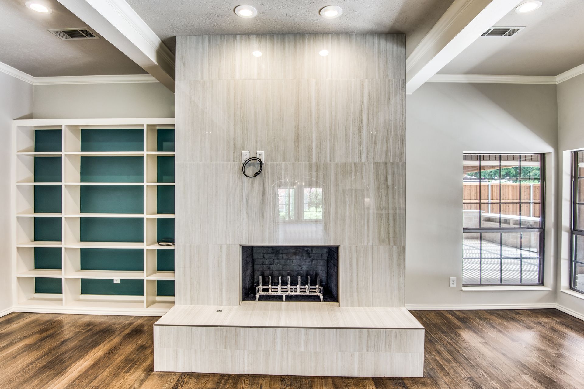 Plano home remodel fireplace and shelves