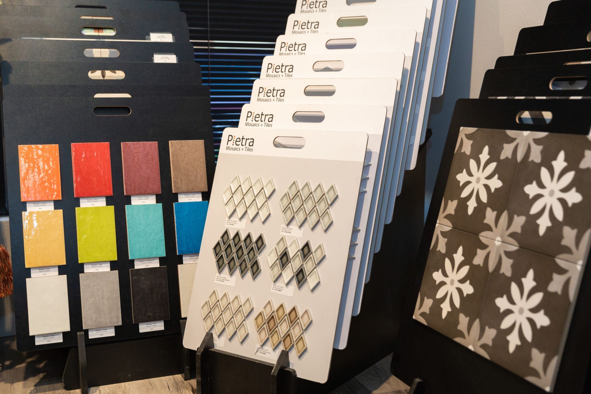 A variety of tiles are displayed in a store