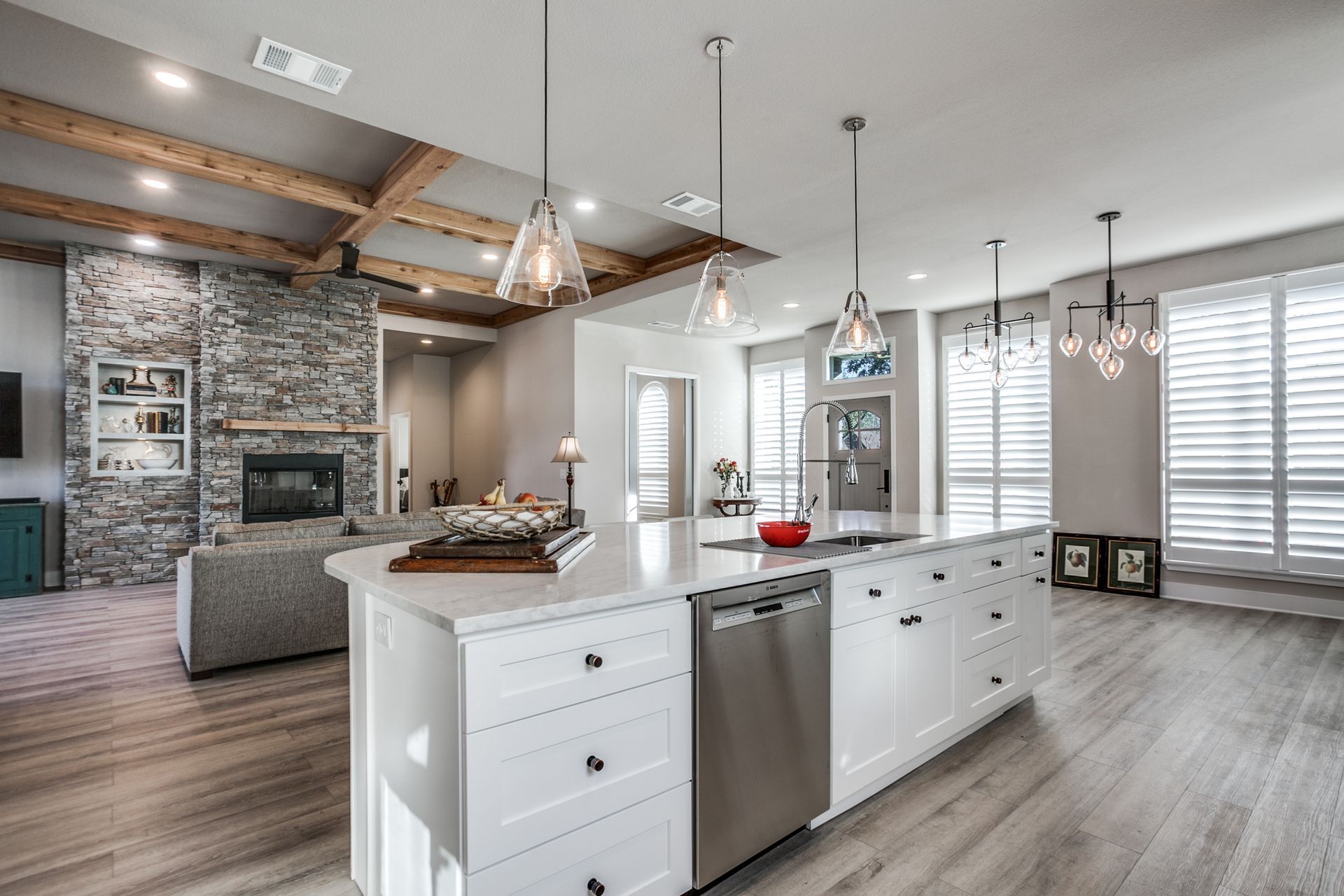 There is a large island in the middle of the kitchen.