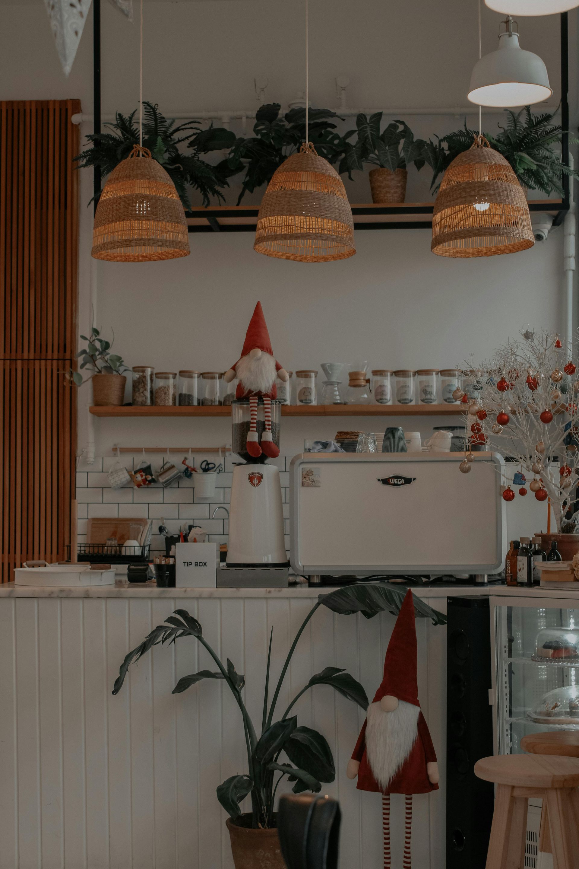 A kitchen with a counter and a coffee machine.
