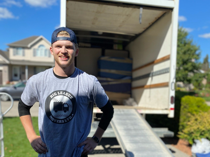 Couple taking a selfie while moving in together